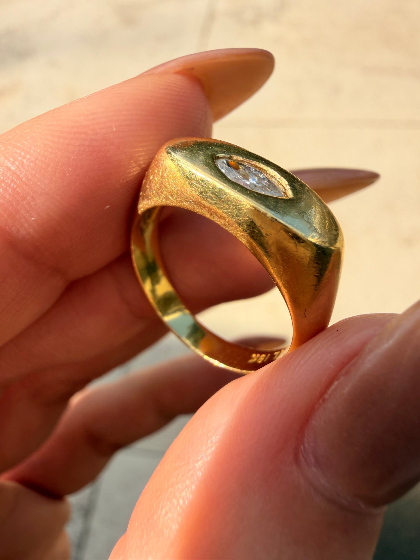 Vintage yellow 18K gold and .2 ctw marquise diamond flush set ring, size 6.75