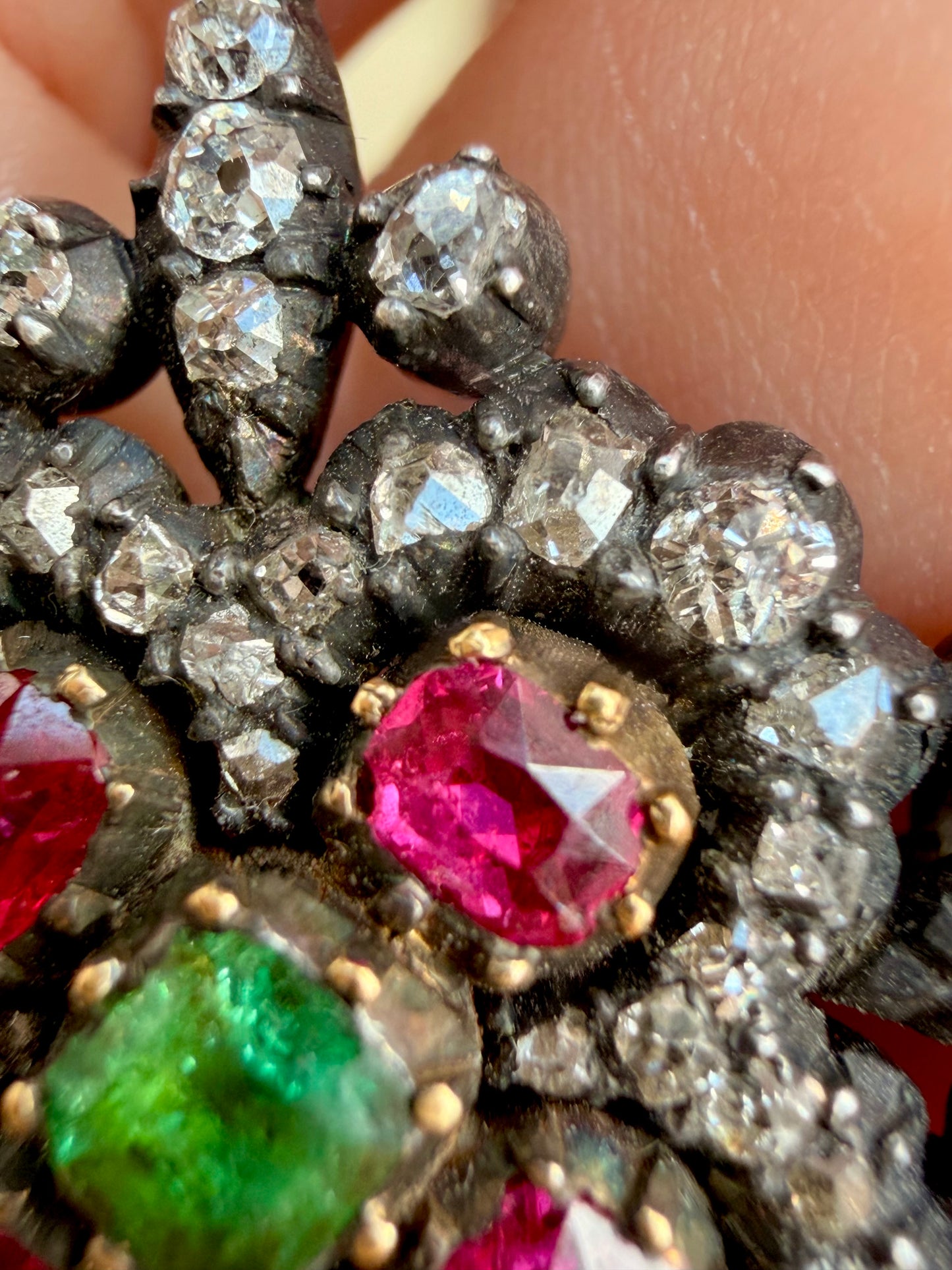 Antique 18K and silver approx 1.6 ctw old mine, peruzzi and old cut diamond, .75 ctw Burma ruby, and .38 ctw emerald brooch