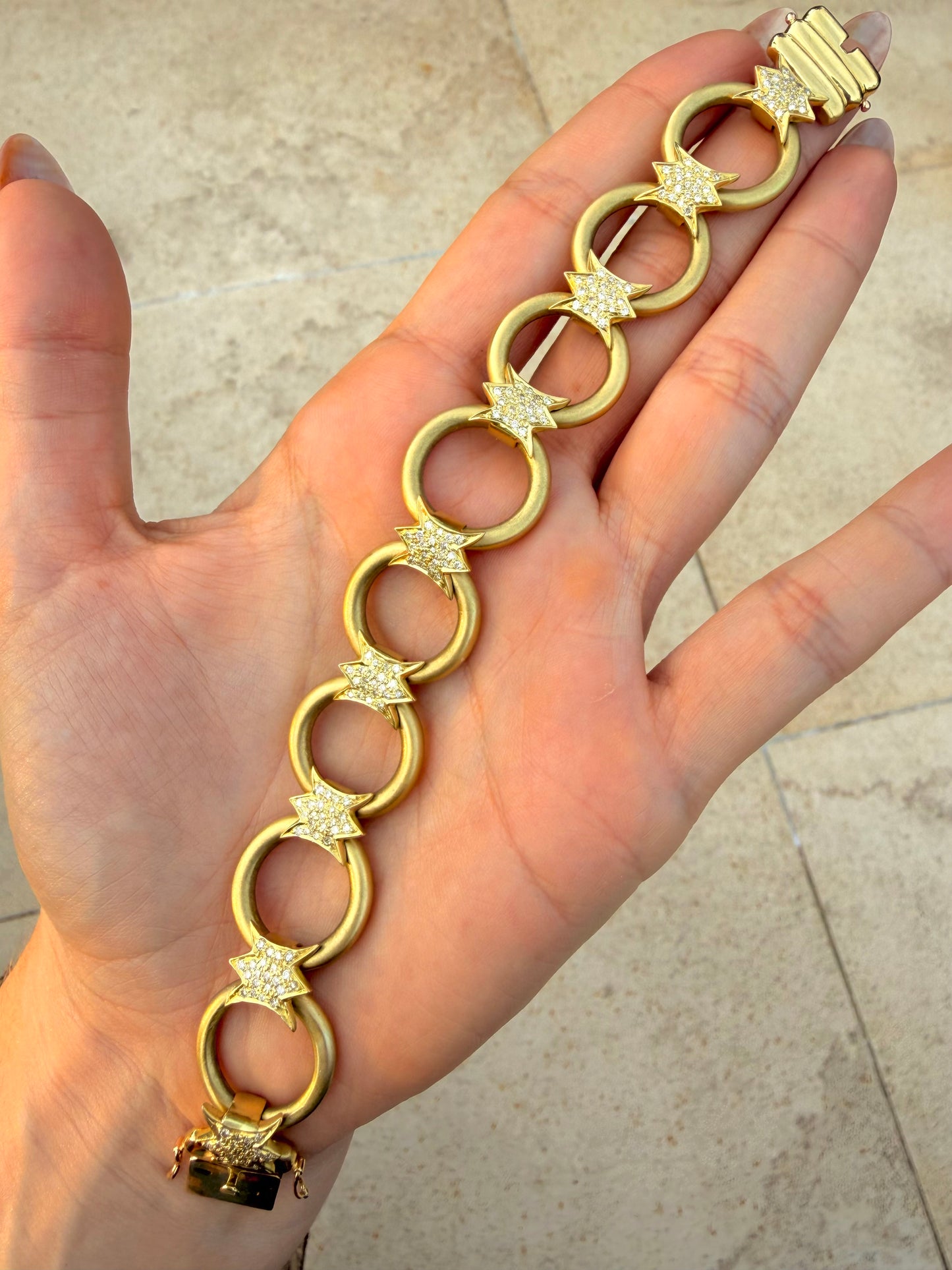 Vintage yellow 18K approx .85ctw champagne diamond starburst station open link bracelet, 7.25 inch