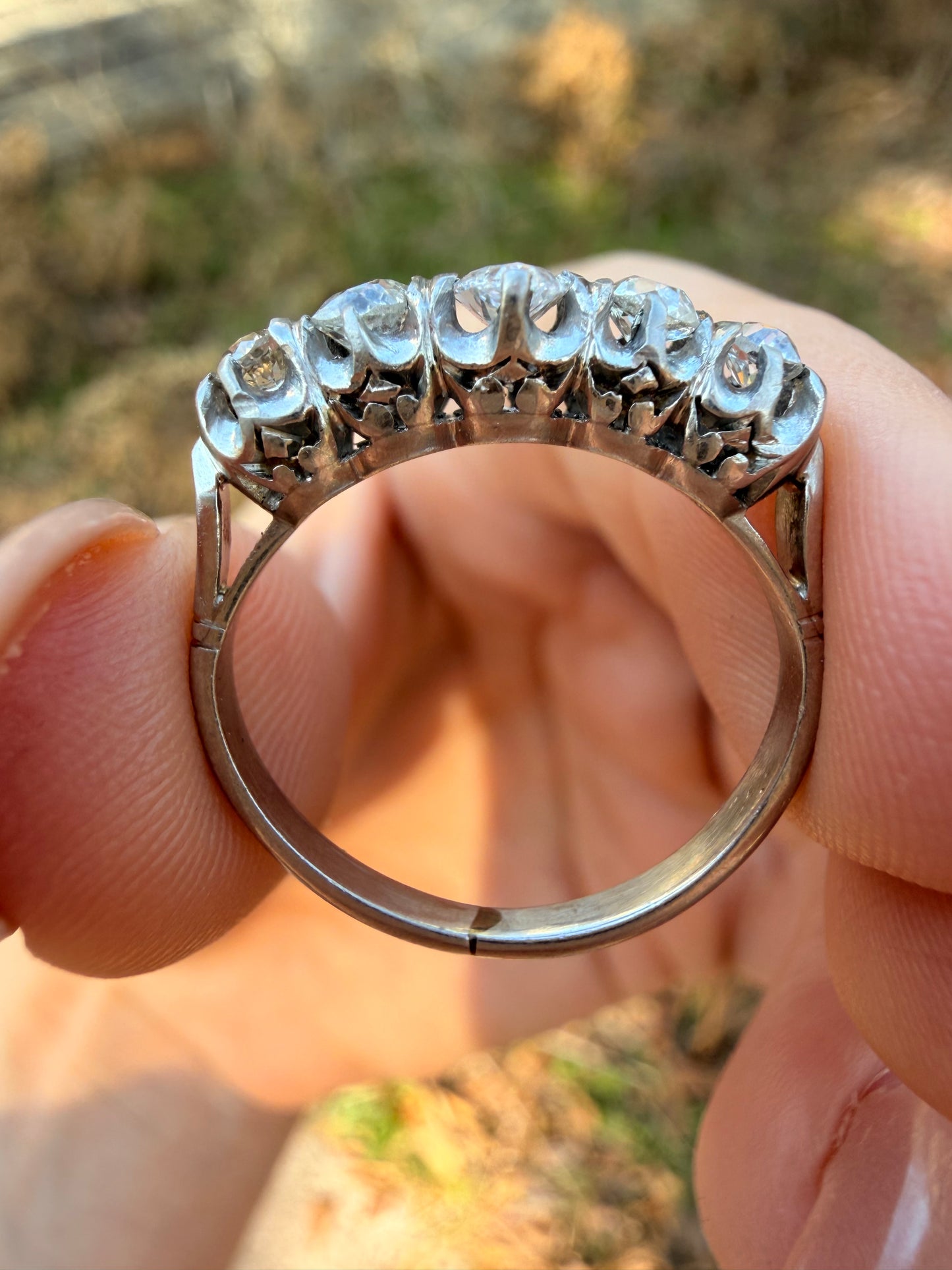 Antique platinum approx 1.1ctw moval diamond and old mine cut diamond 5 stone ring, size 5.5-5.75