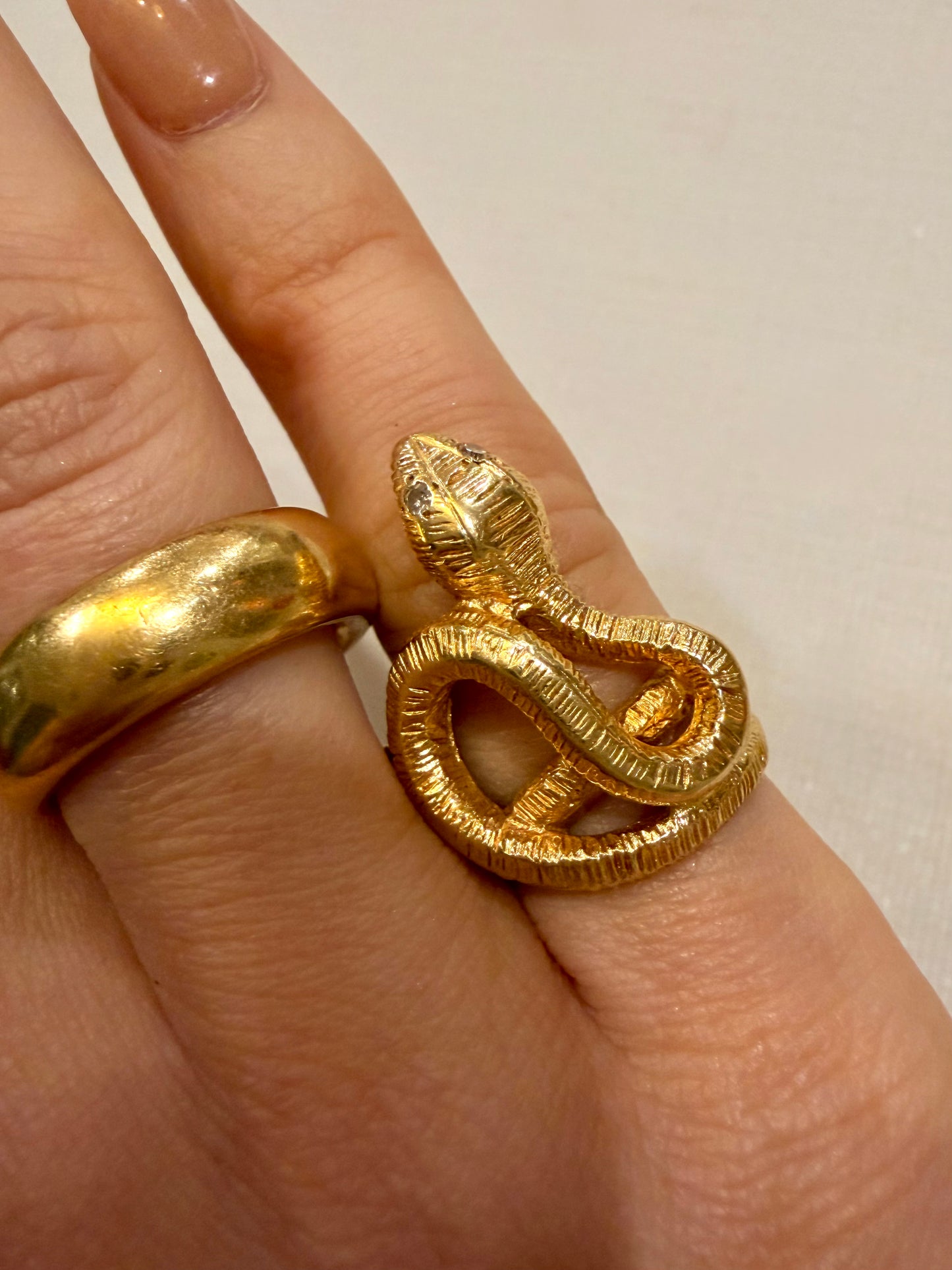 Vintage yellow 14K textured coiled snake ring with diamond eyes, size 4.25
