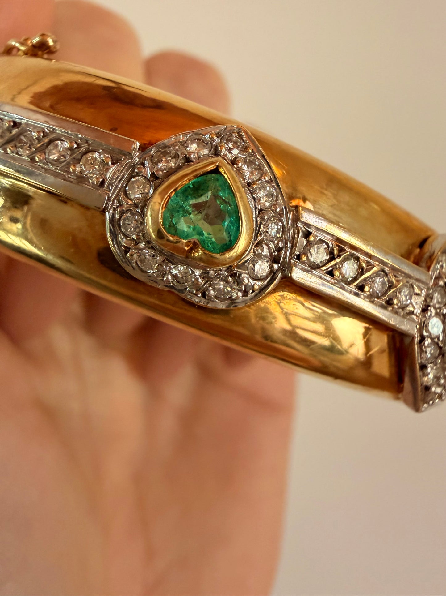 Vintage yellow 18K triple 1.73 ctw emerald and 1.14 ctw diamond heart bangle