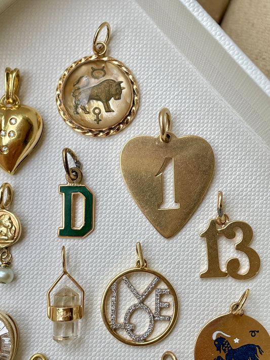 Vintage yellow 14K gold reverse crystal Taurus charm