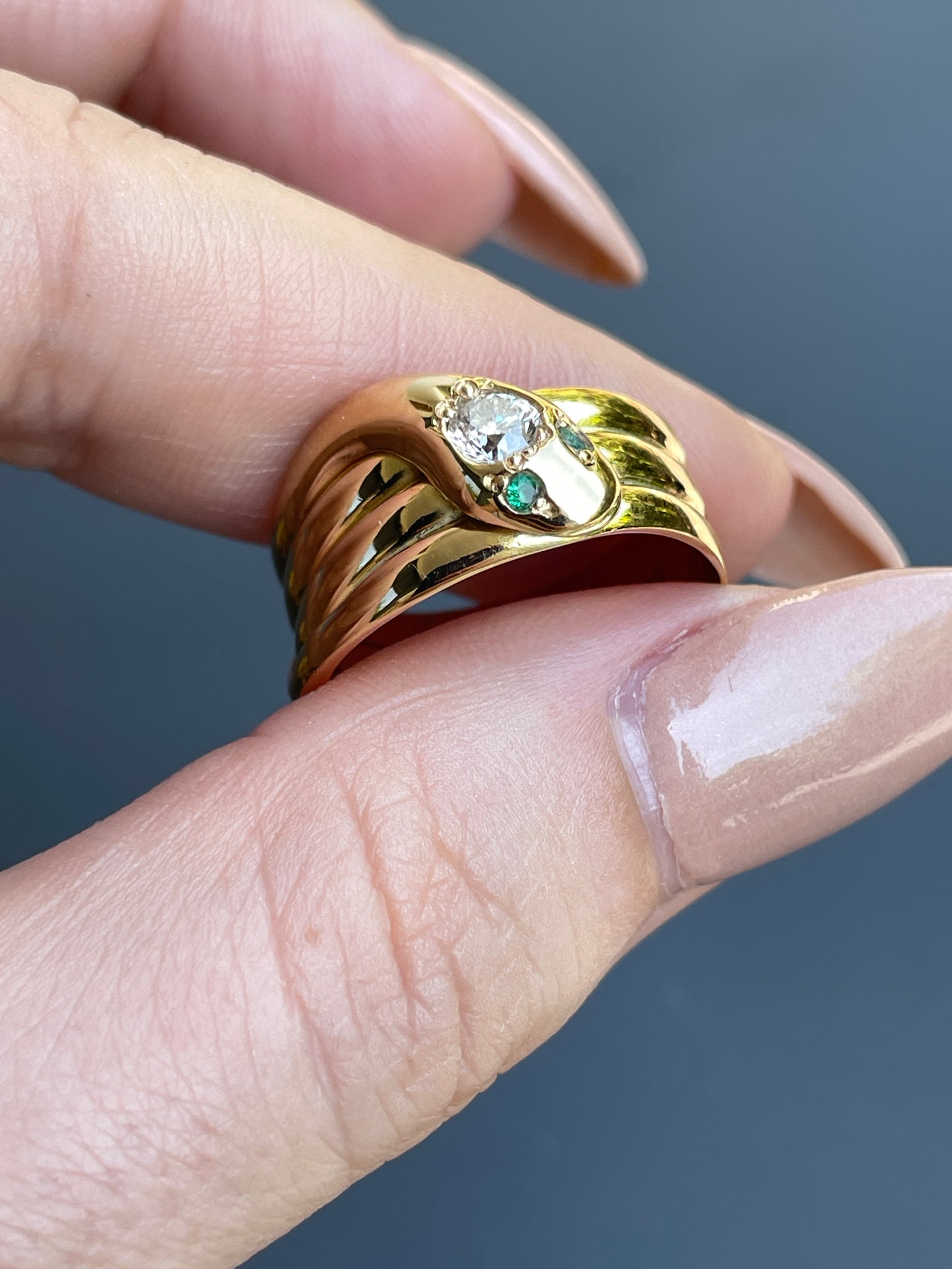 Vintage yellow 18K snake ring with approx .45 ctw diamond and emerald eyes, size 7.5