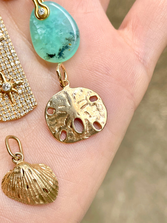 Vintage yellow 14K sanddollar charm