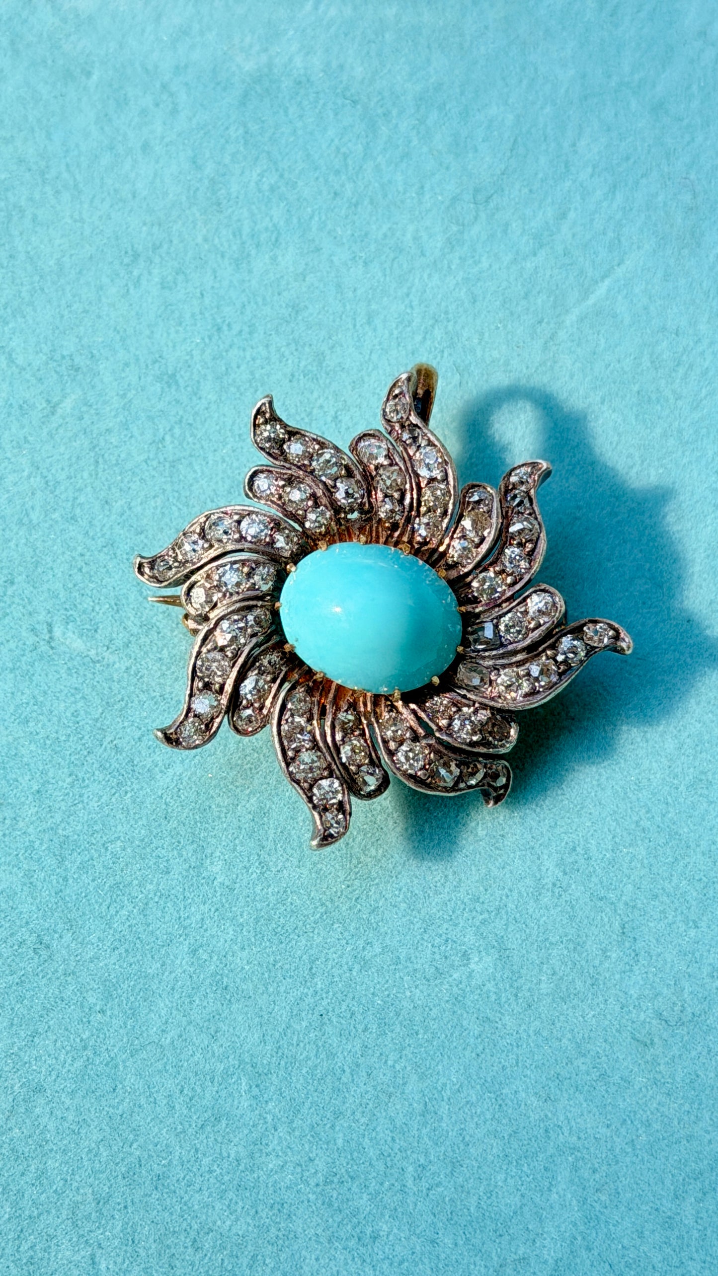 Antique turquoise cabochon and over 1 ctw old cut diamond floral starburst pendant/pin