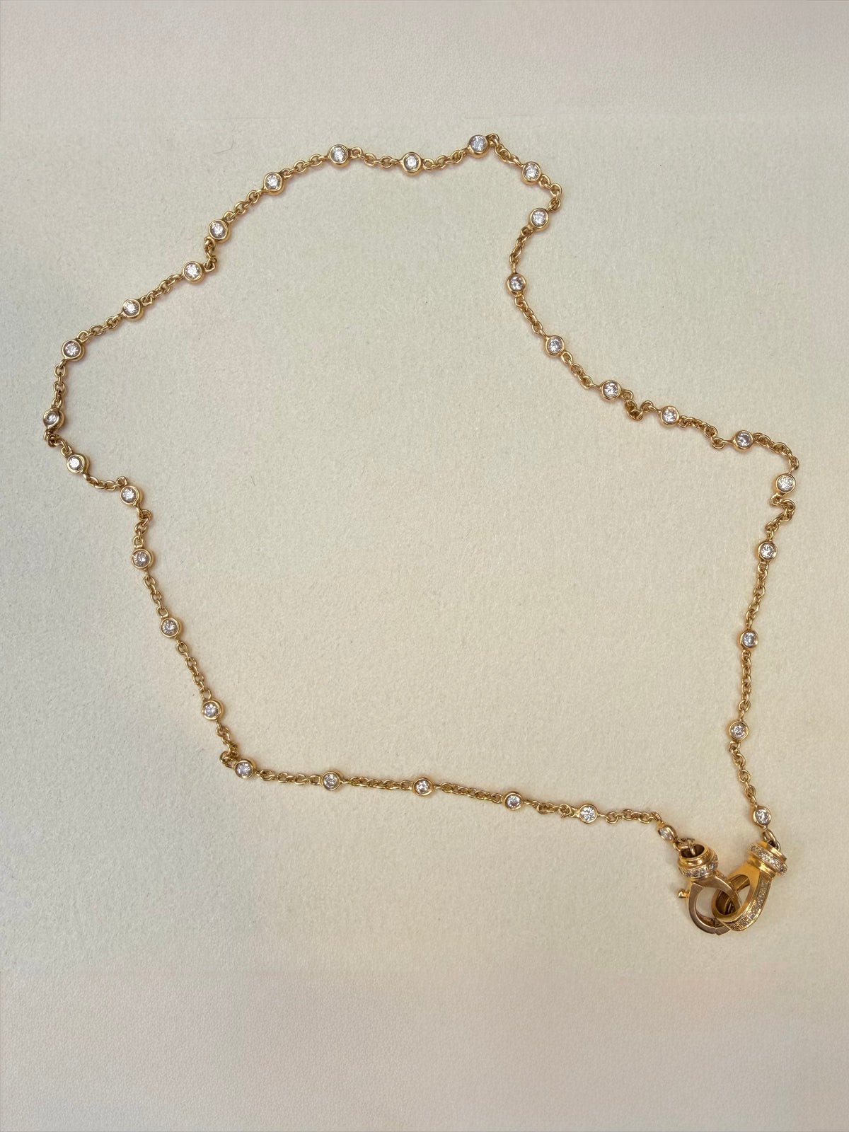 Vintage yellow 14K approx 1.4 ctw diamond bezel station chain with cuff clasp, 17.5 inch