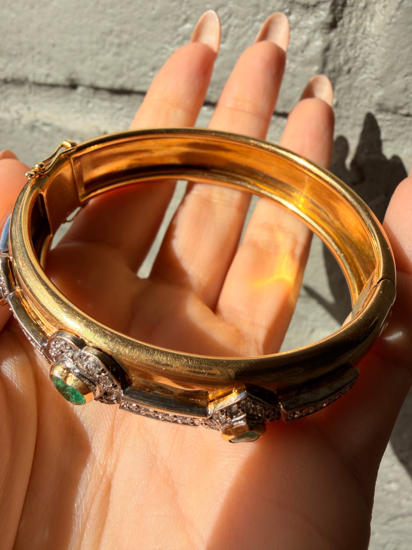 Vintage yellow 18K triple 1.73 ctw emerald and 1.14 ctw diamond heart bangle