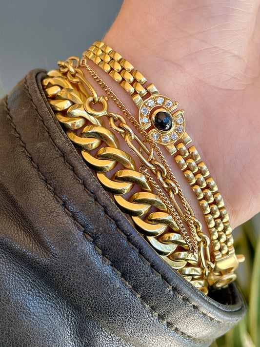 Vintage yellow 18K gold 1.6 ctw cabochon sapphire and .6 ctw diamond panther link bracelet, 7.5 inch
