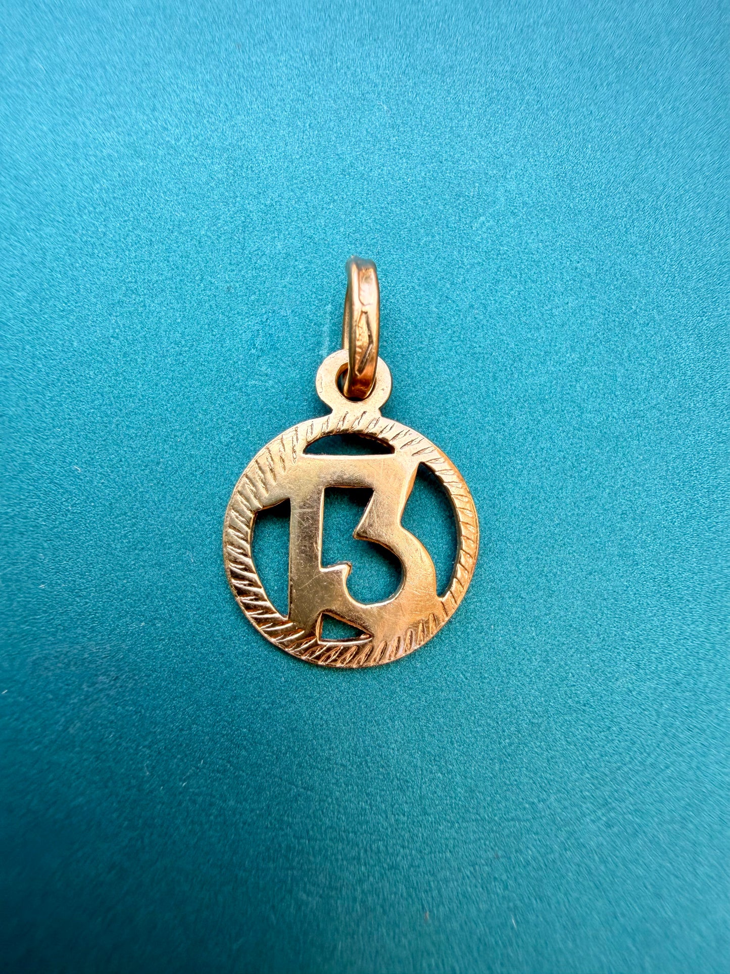 Vintage yellow 18K gold number 13 charm