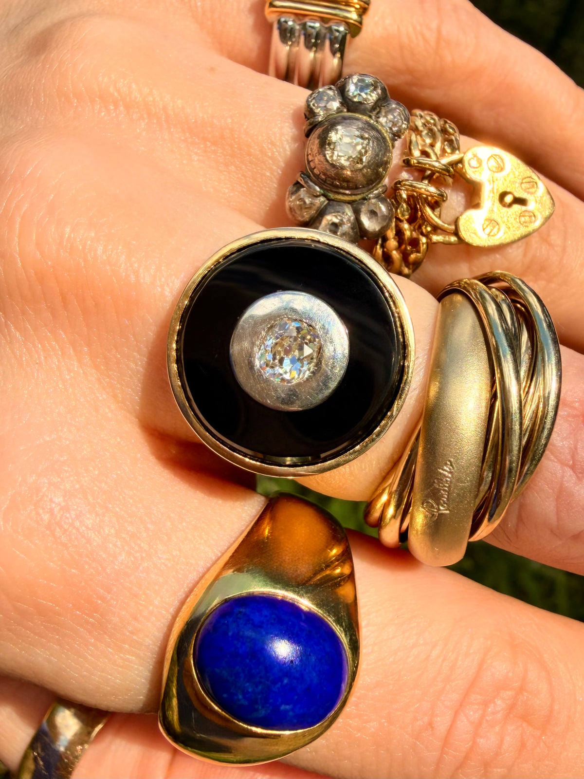 Vintage 18K onyx target ring with .5 ctw old mine cut diamond, size 7.25-7.5