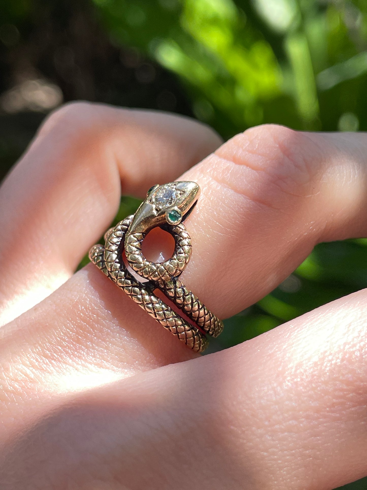 Vintage yellow 14K textured snake ring with .1 ctw diamond and emerald eyes, size 6