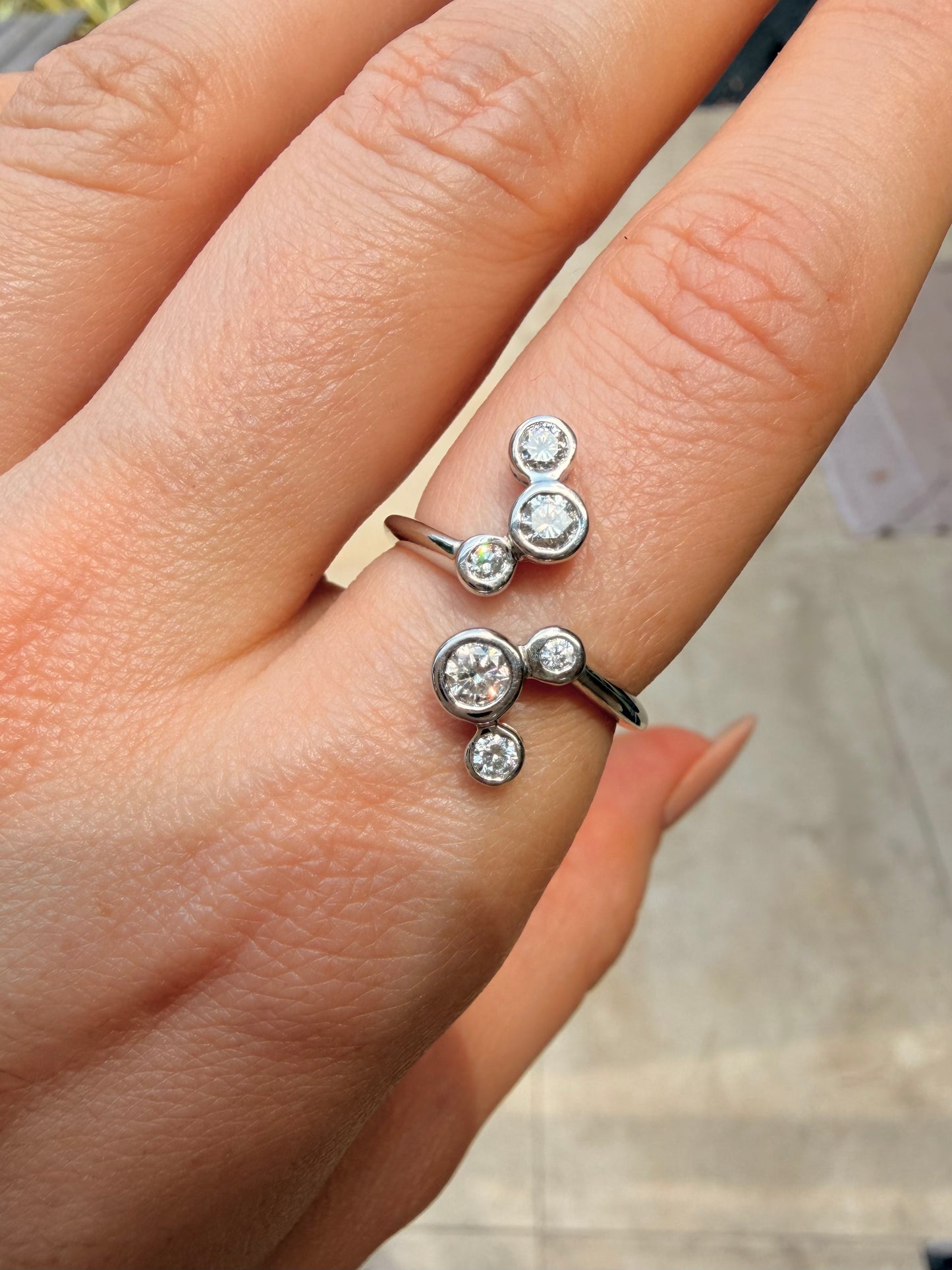 White 14K bezel set approx .55ctw diamond bubble ring, size 7.5
