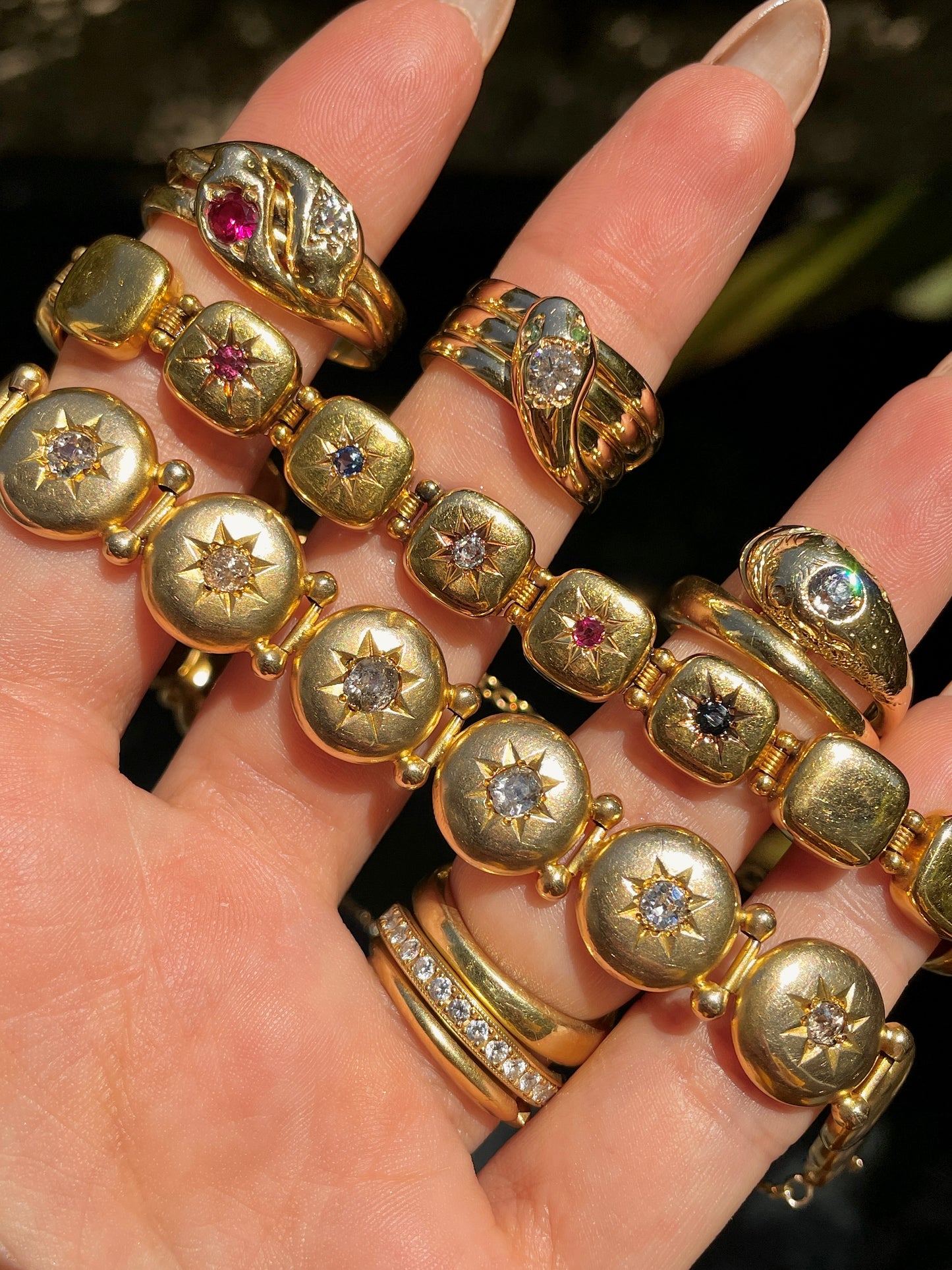 Antique yellow 14K Victorian old mine cut diamond, ruby and sapphire starburst bracelet, 6 and 5/8 inch