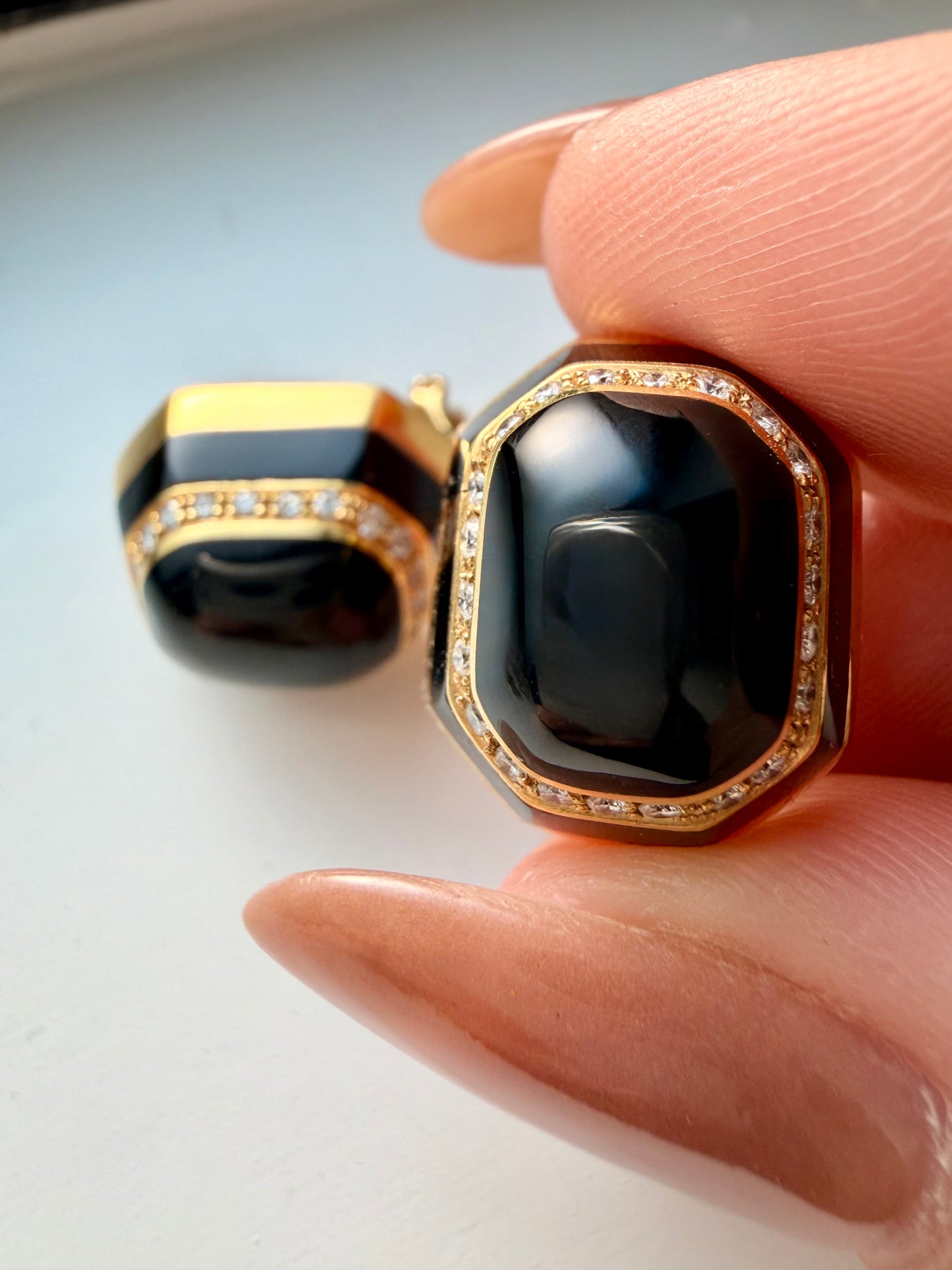 Vintage yellow 18K onyx and approx .33ctw diamond omega back earrings