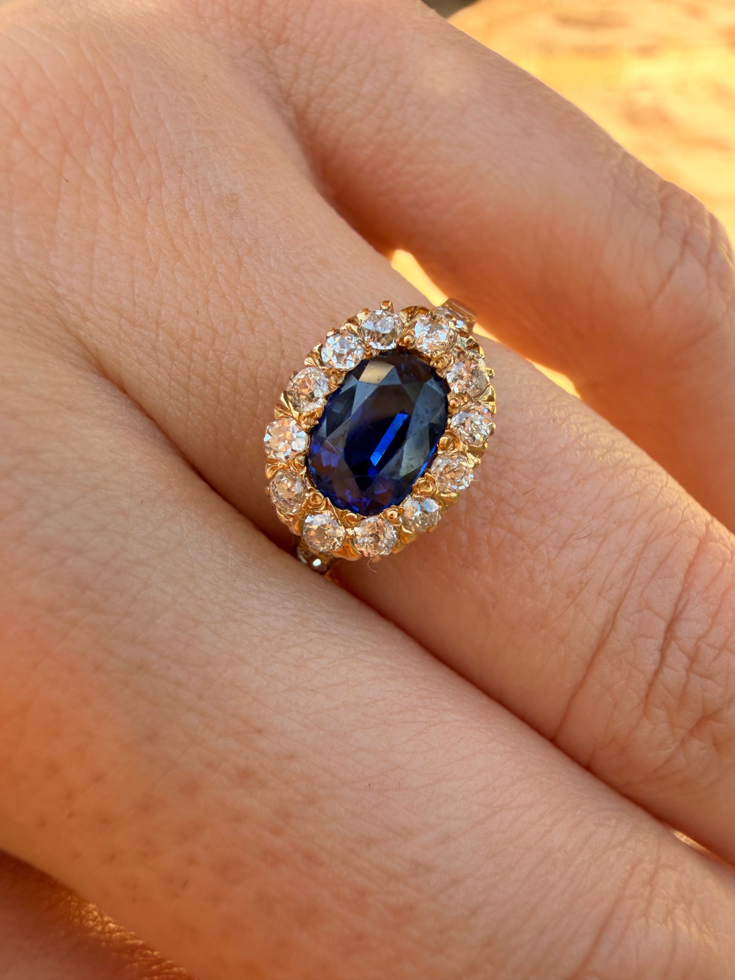 Antique yellow 14K unheated 1.05ctw royal blue sapphire and approx .38ctw diamond halo ring, size 7.25