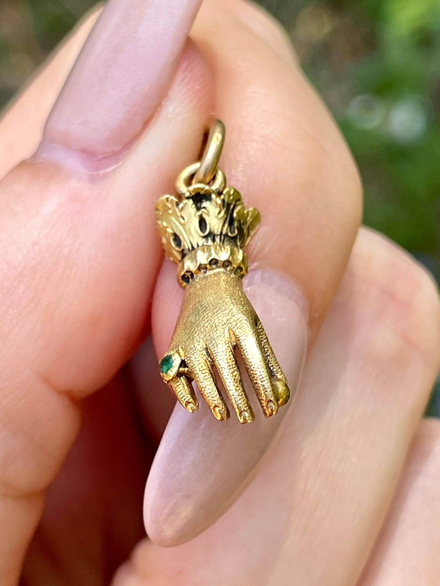 Antique yellow 18K hand charm wearing emerald ring