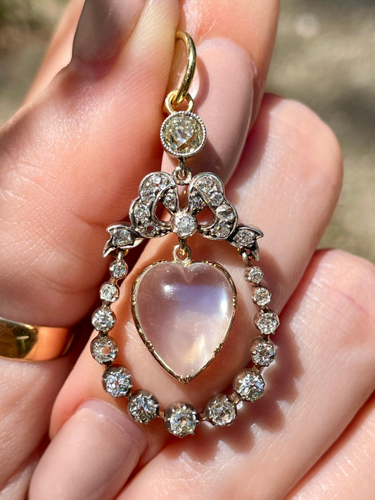 Incredible Antique 18K and 14K approx 1.22 ctw diamond and heart shaped moonstone bow pendant