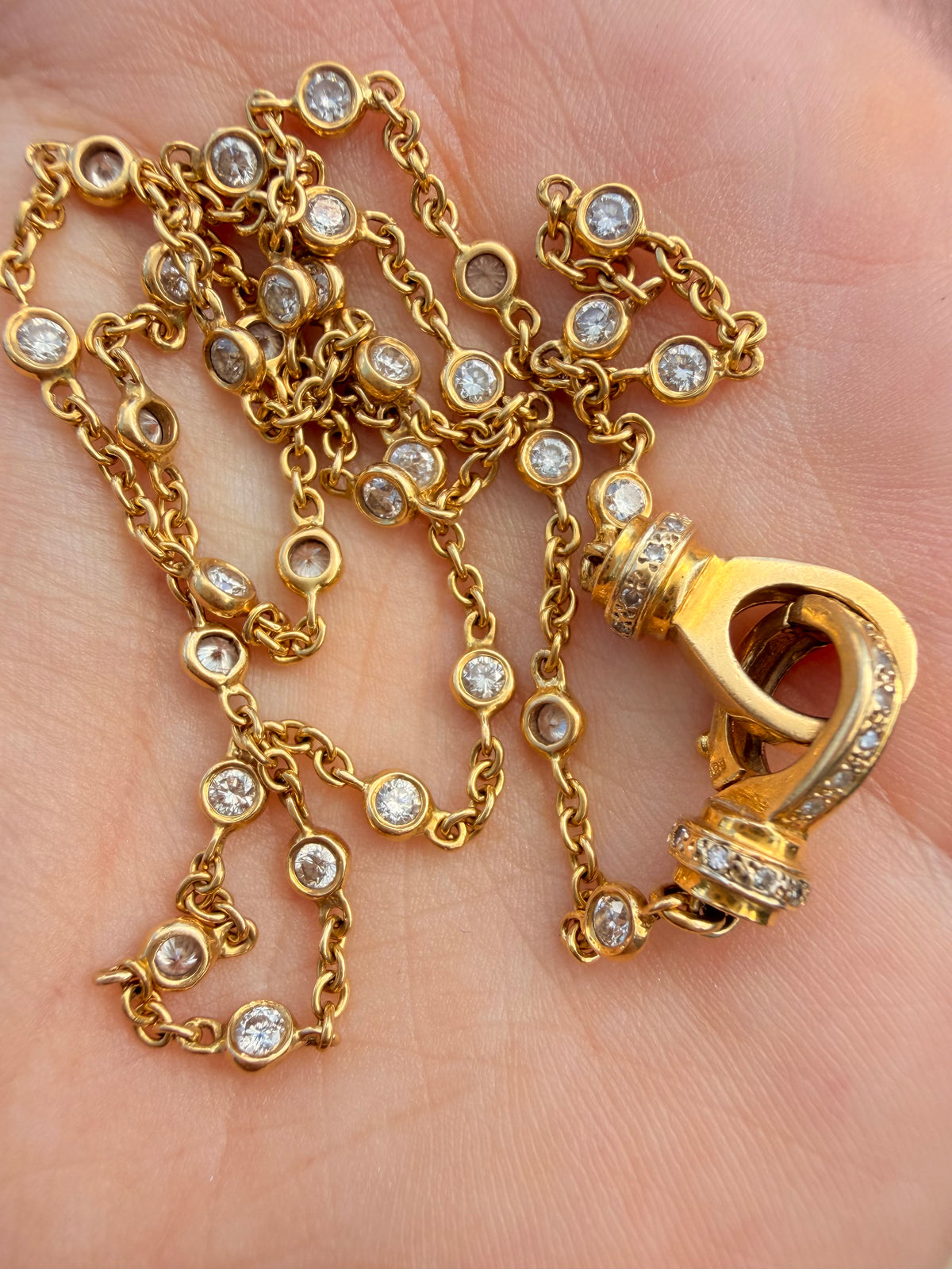 Vintage yellow 14K approx 1.4 ctw diamond bezel station chain with cuff clasp, 17.5 inch