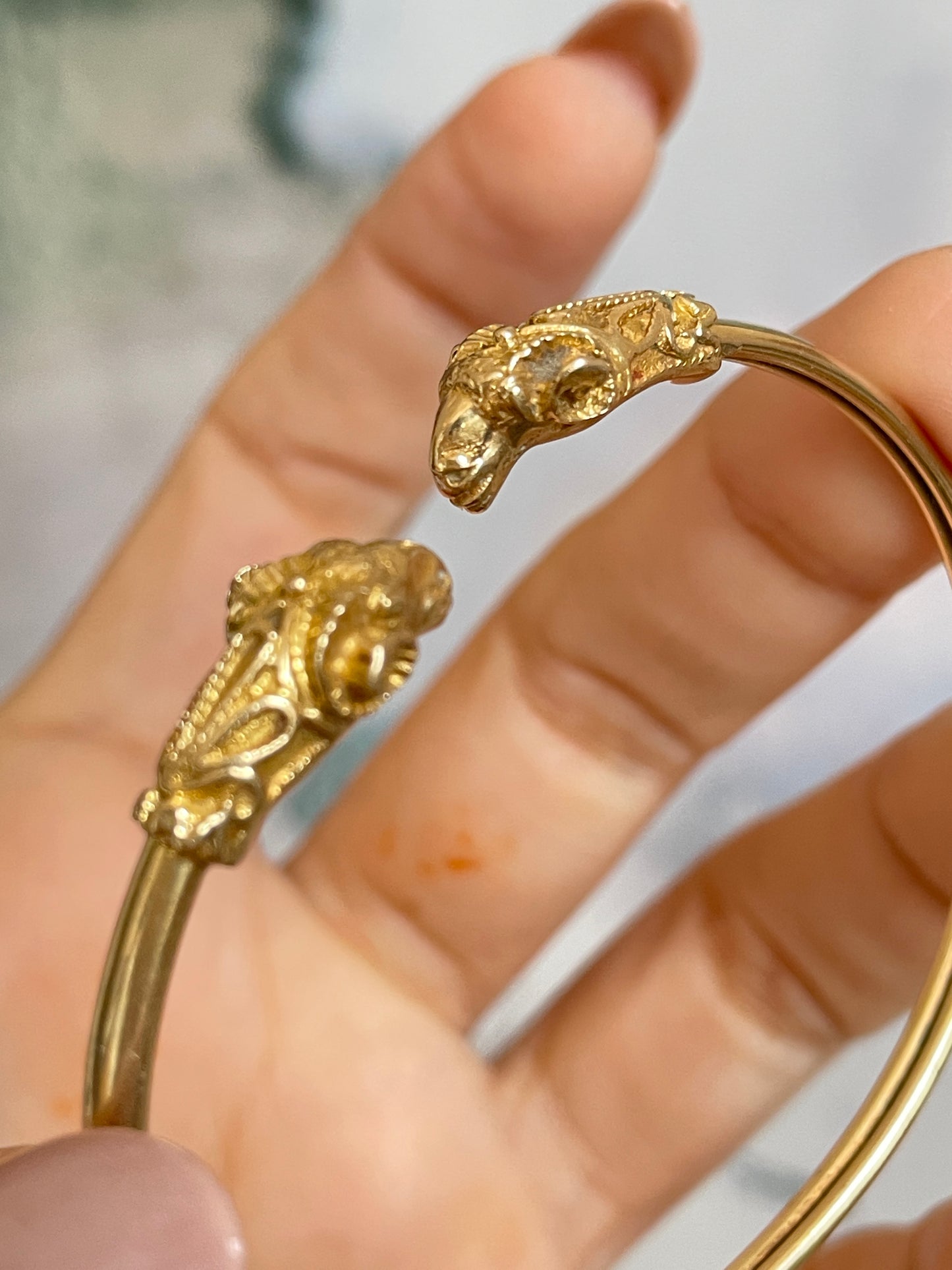 Vintage yellow 14K gold ram heads bangle