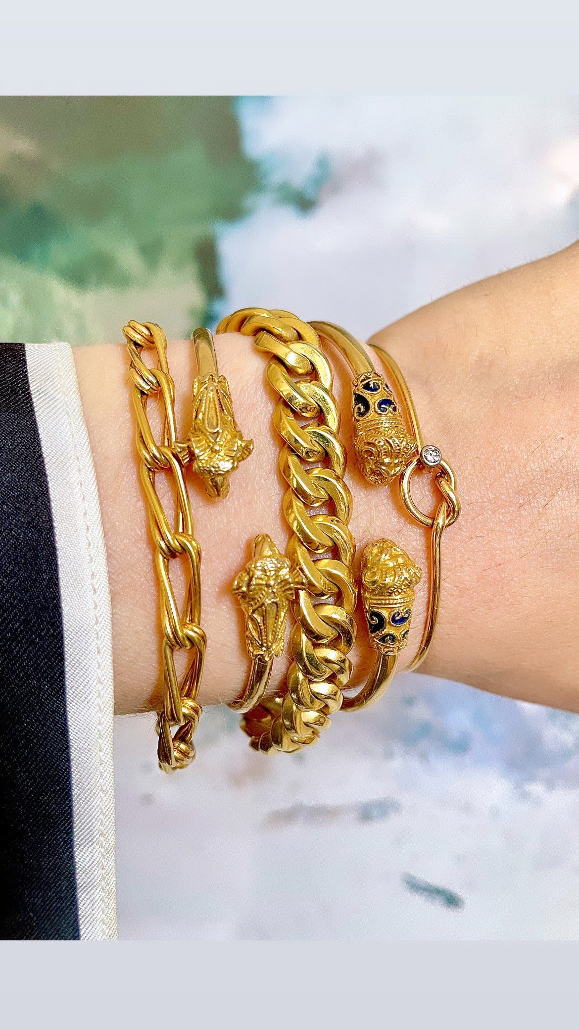 Vintage yellow 14K gold and blue enamel lion heads bangle
