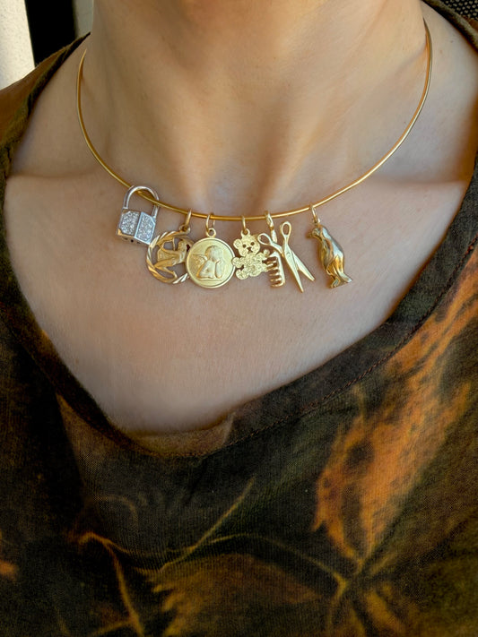Vintage yellow 14K and 18K charm drop - June 2026