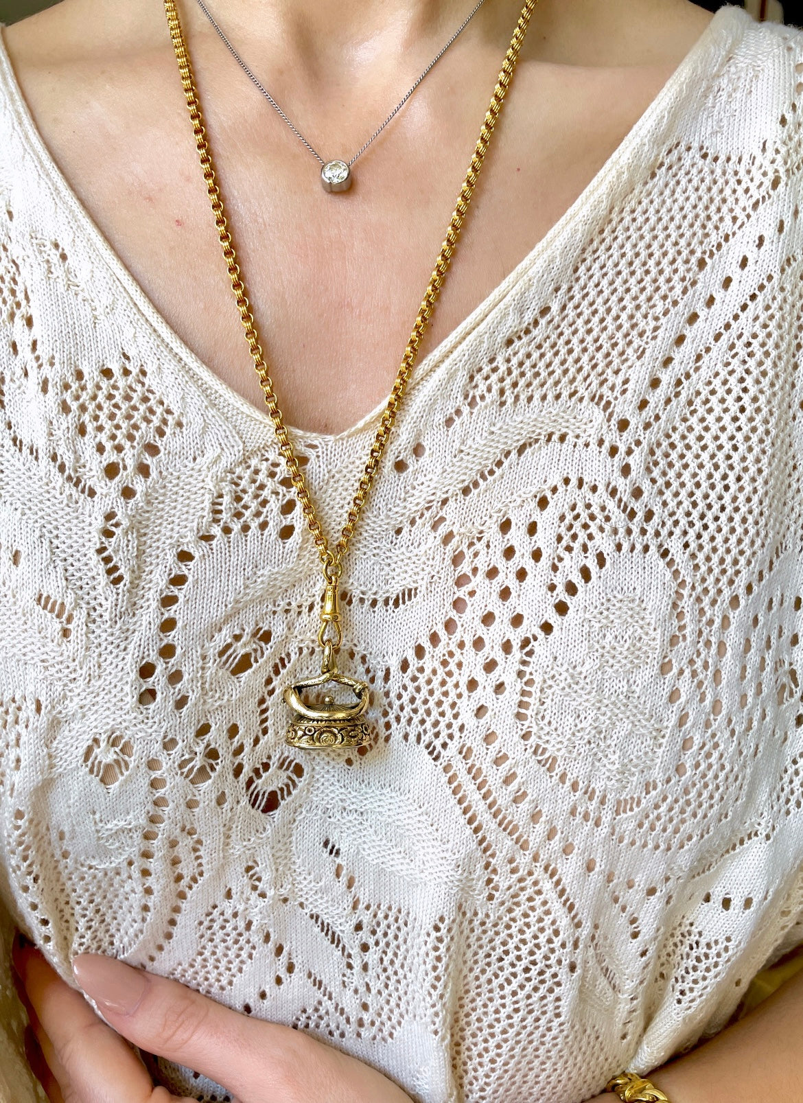 Antique 14K snake and floral fob with faceted foil back quartz