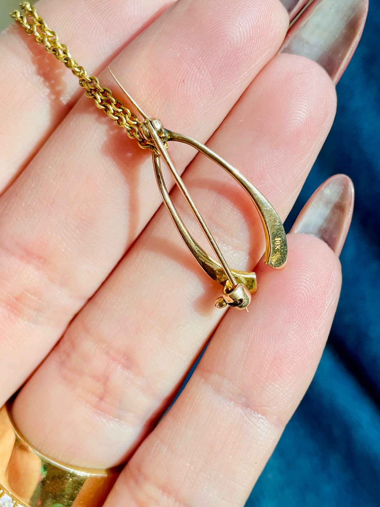 Vintage yellow 10K gold seed pearl wishbone pin