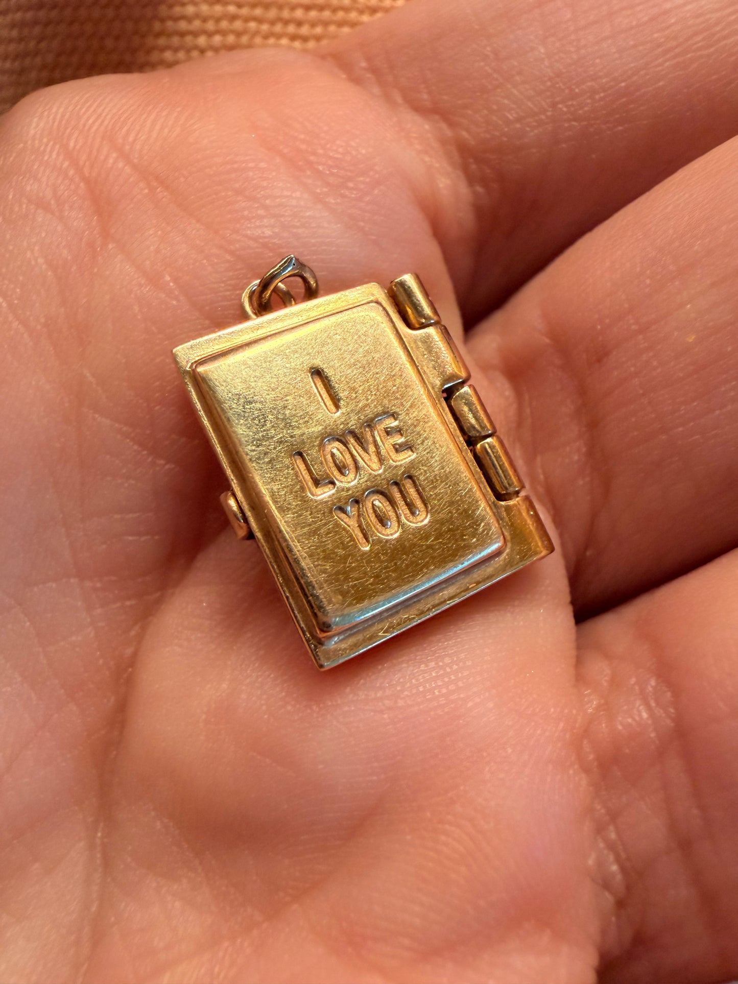 Vintage yellow 14K gold articulated marriage license book charm
