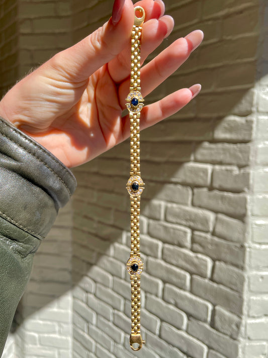 Vintage yellow 18K gold 1.6 ctw cabochon sapphire and .6 ctw diamond panther link bracelet, 7.5 inch