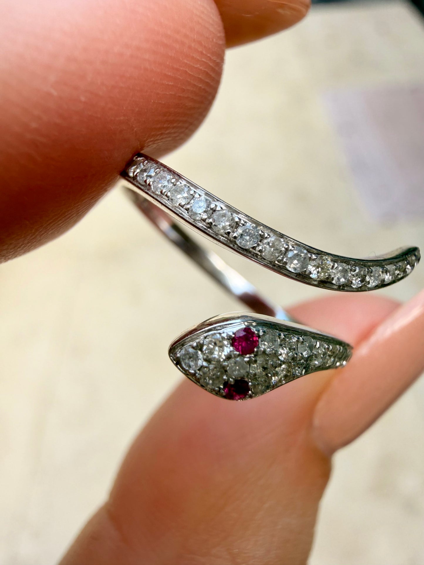 White 14K diamond and ruby snake ring, size 6.25