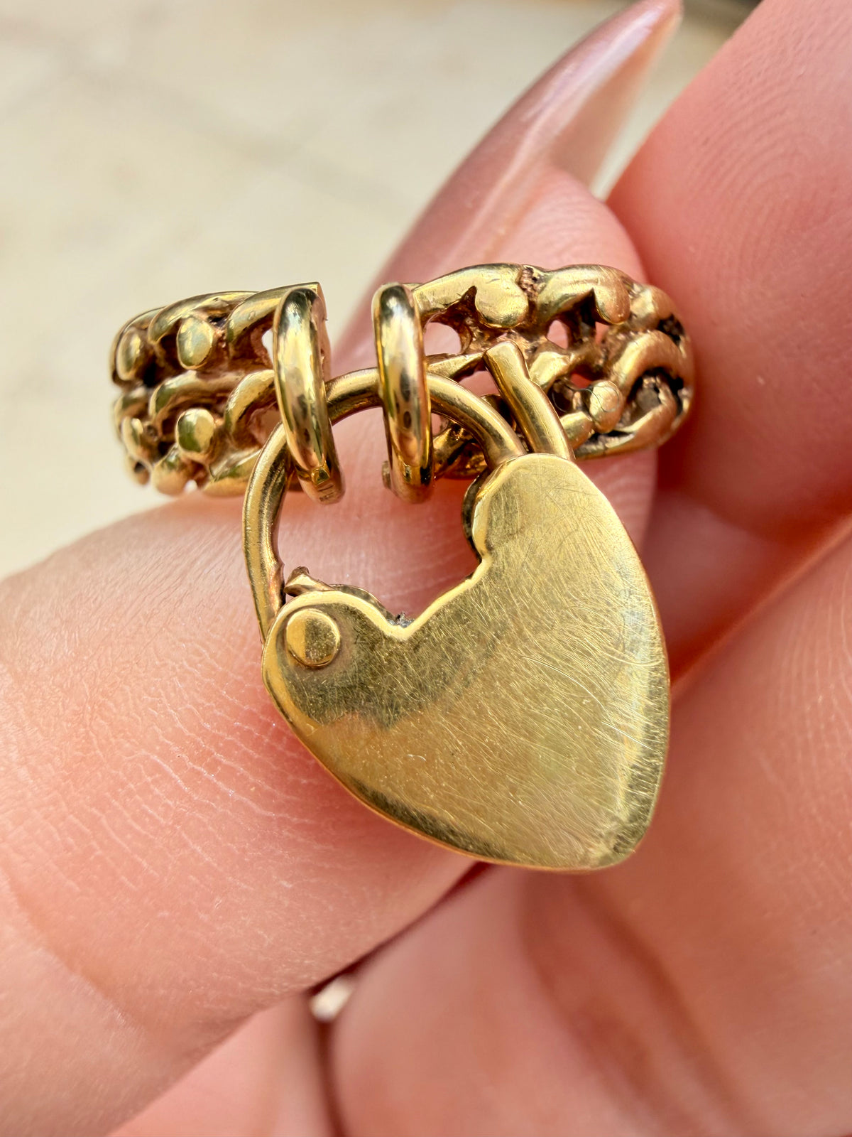 Antique yellow 14K knot ring with operating padlock, size 6.75