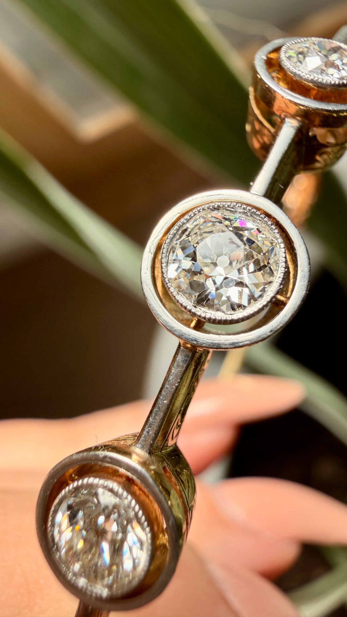 Antique yellow 14K and platinum 1.5ctw Old Mine Cut Diamond 3 stone bangle, 7 inch