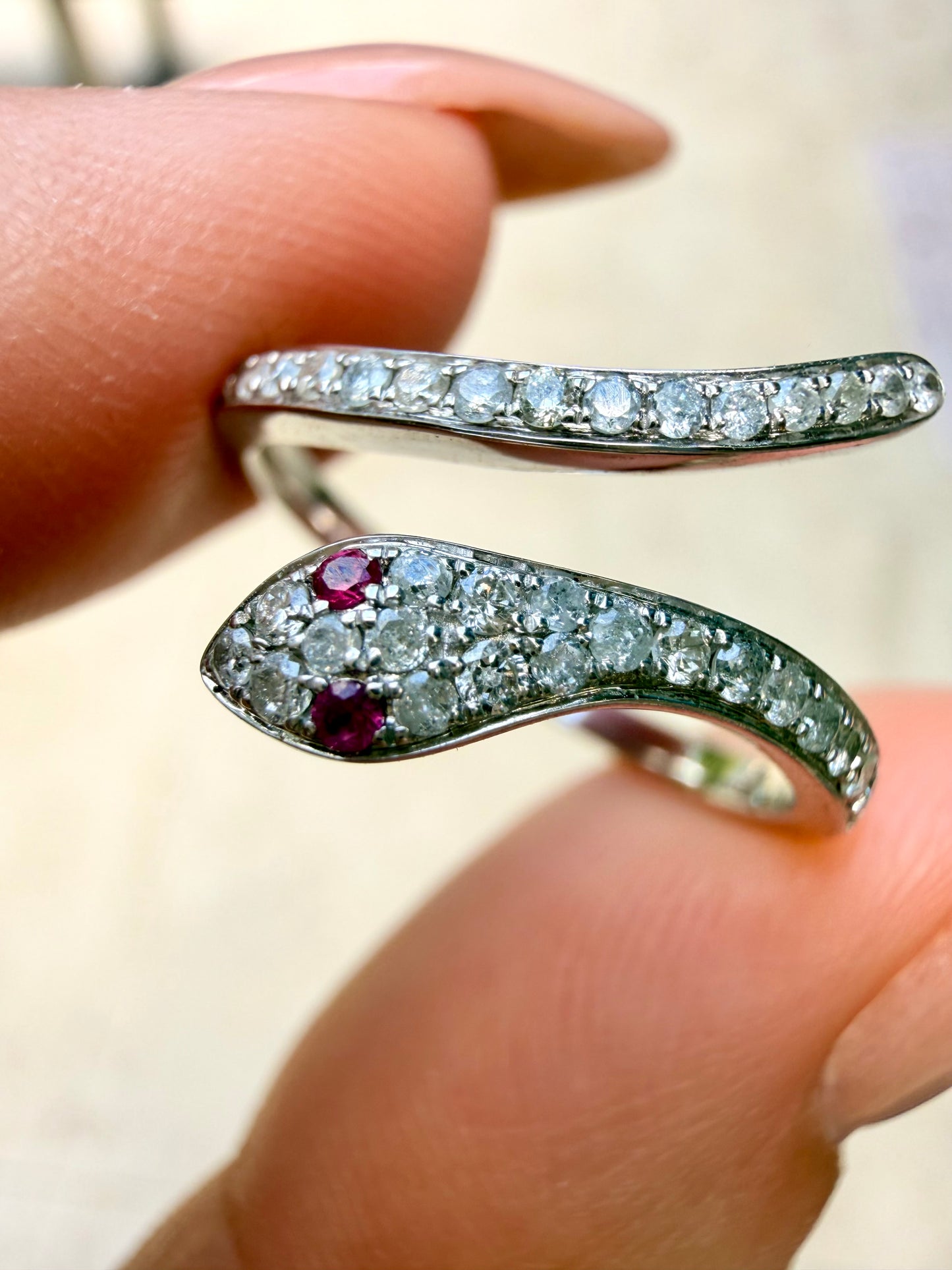 White 14K diamond and ruby snake ring, size 6.25