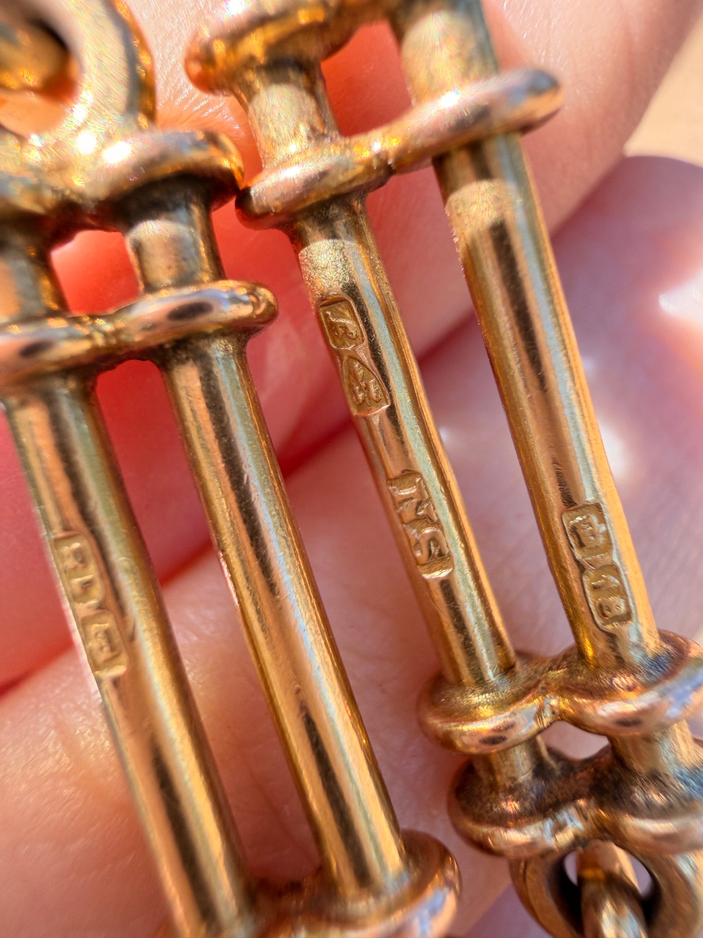 Antique yellow 18K fancy trombone watch chain with double dog clips, 19 and 1/8 inch long with extra link for extension