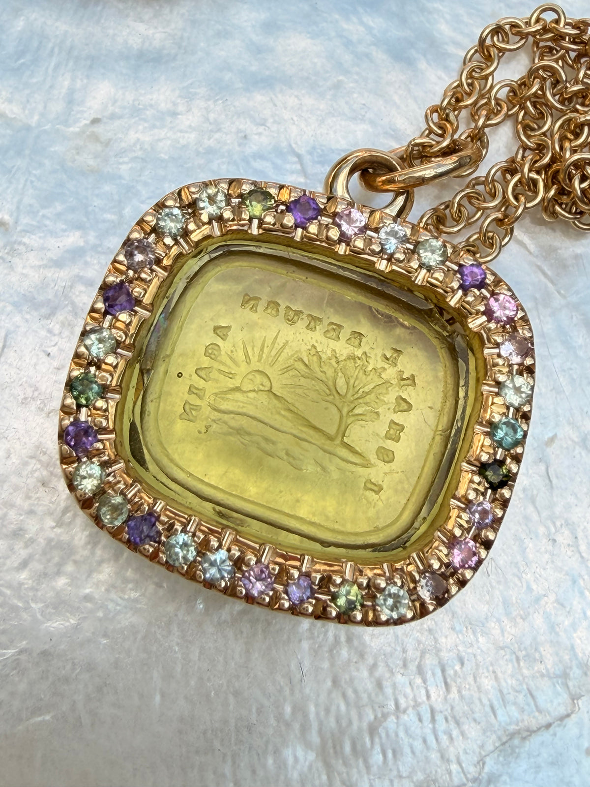 Antique 18K intaglio set in custom yellow 18K tourmaline border pendant by Bauble Magpie