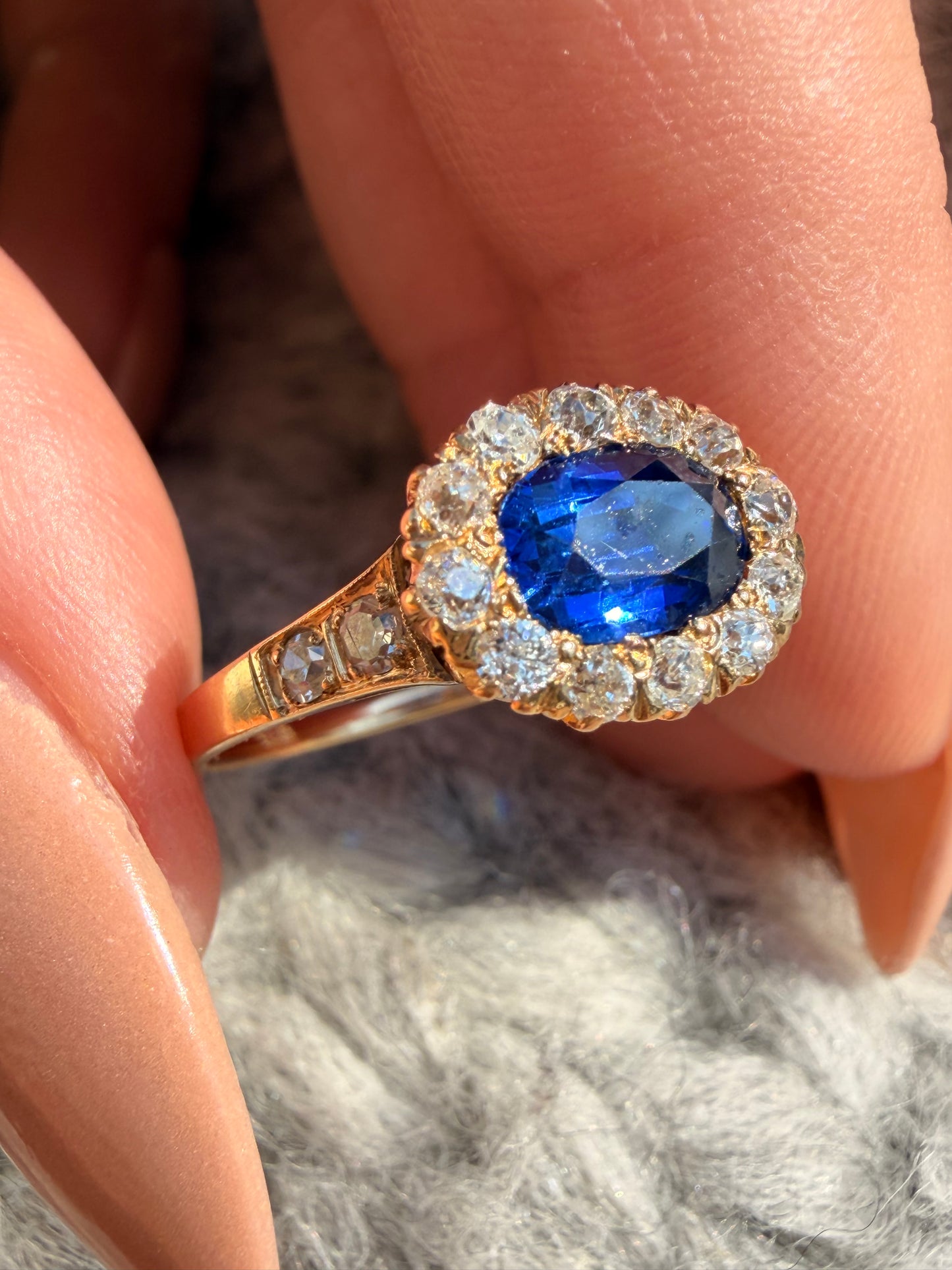 Antique yellow 14K unheated 1.05ctw royal blue sapphire and approx .38ctw diamond halo ring, size 7.25