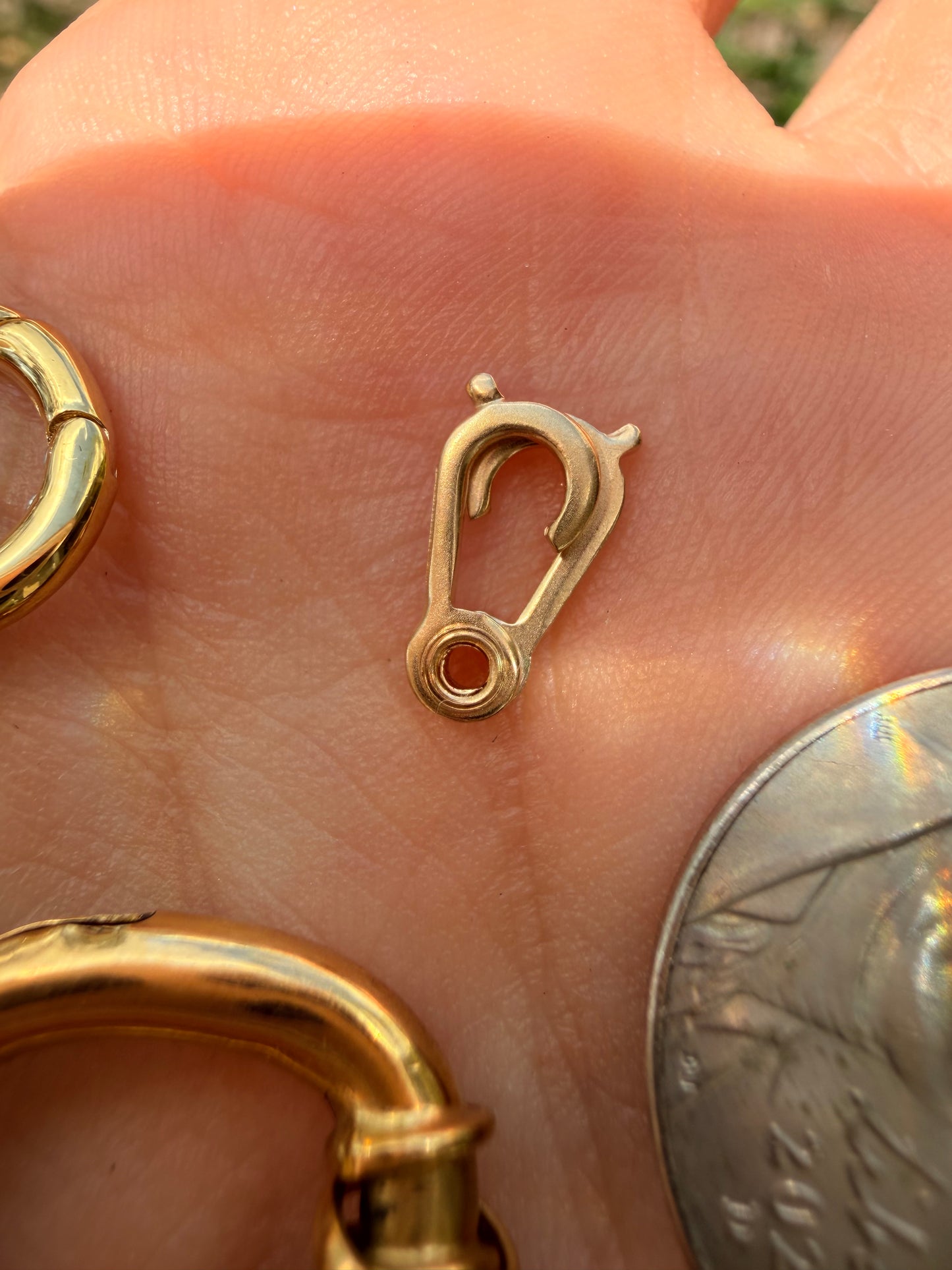 Various solid gold clasps and connectors