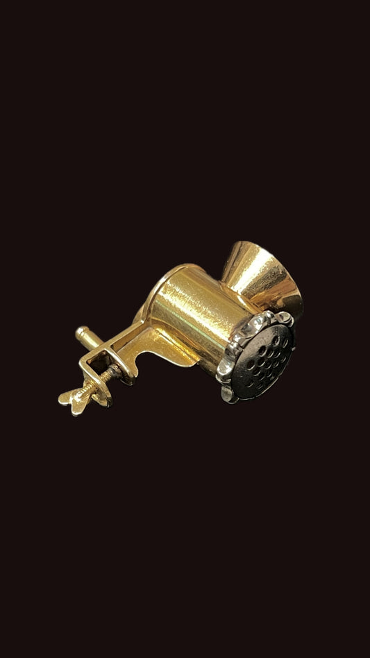 Vintage yellow and white 18K articulated meat grinder charm