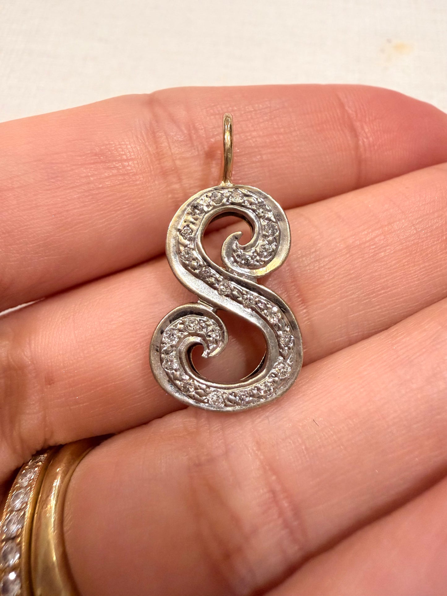 Vintage 14K letter S pendant with approx .2ctw diamonds