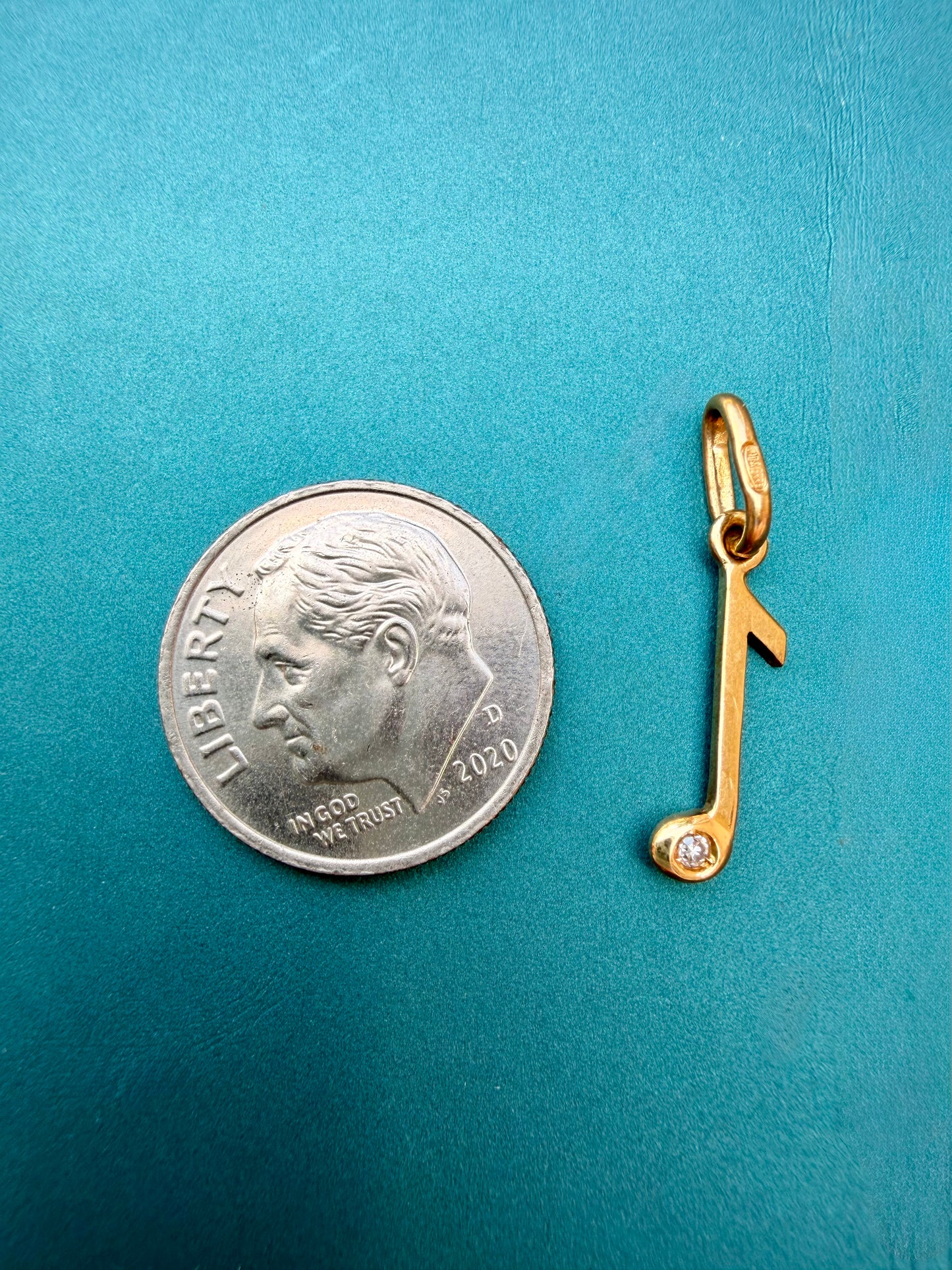 Vintage yellow 18K gold and diamond music note charm