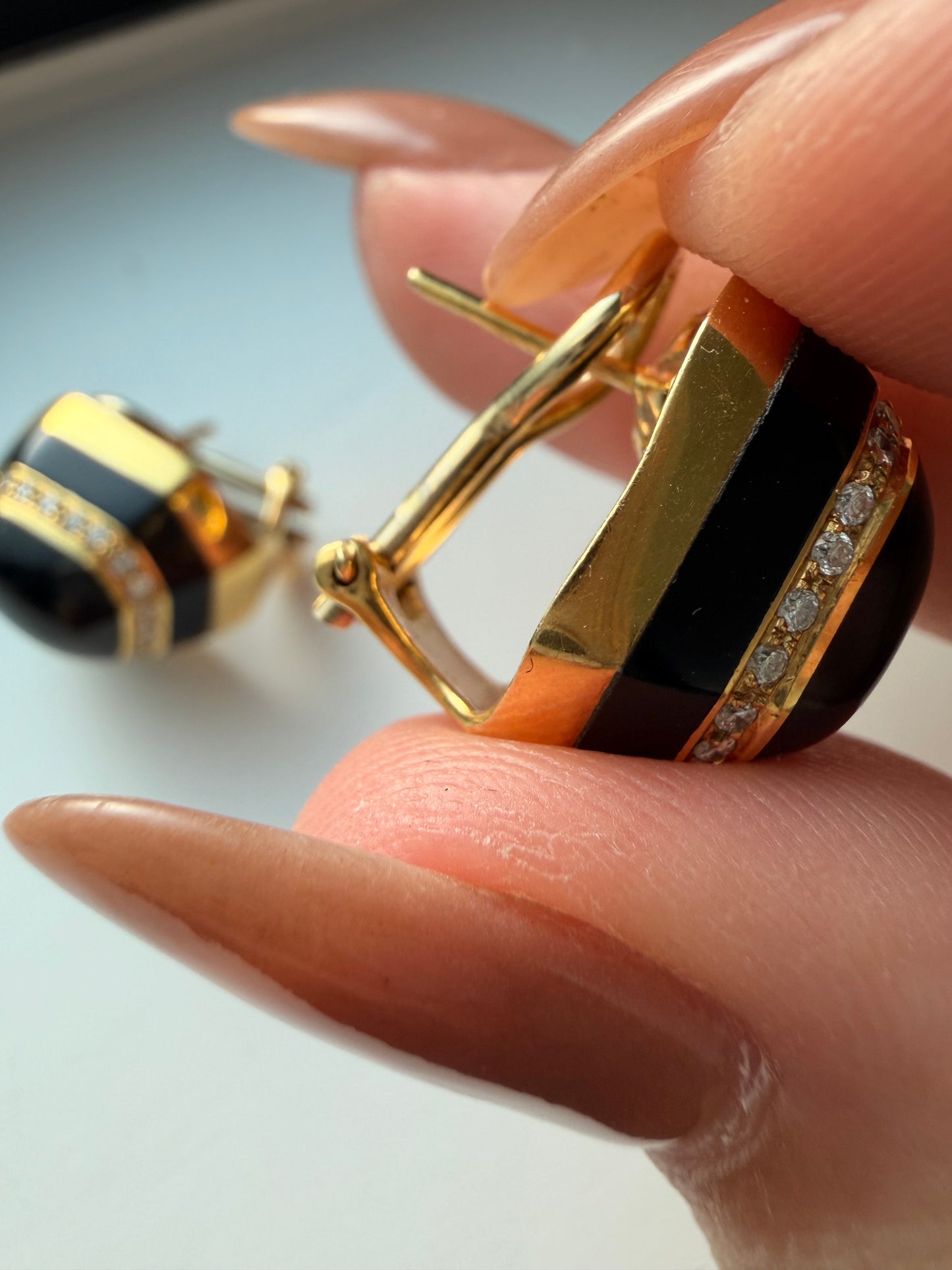 Vintage yellow 18K onyx and approx .33ctw diamond omega back earrings