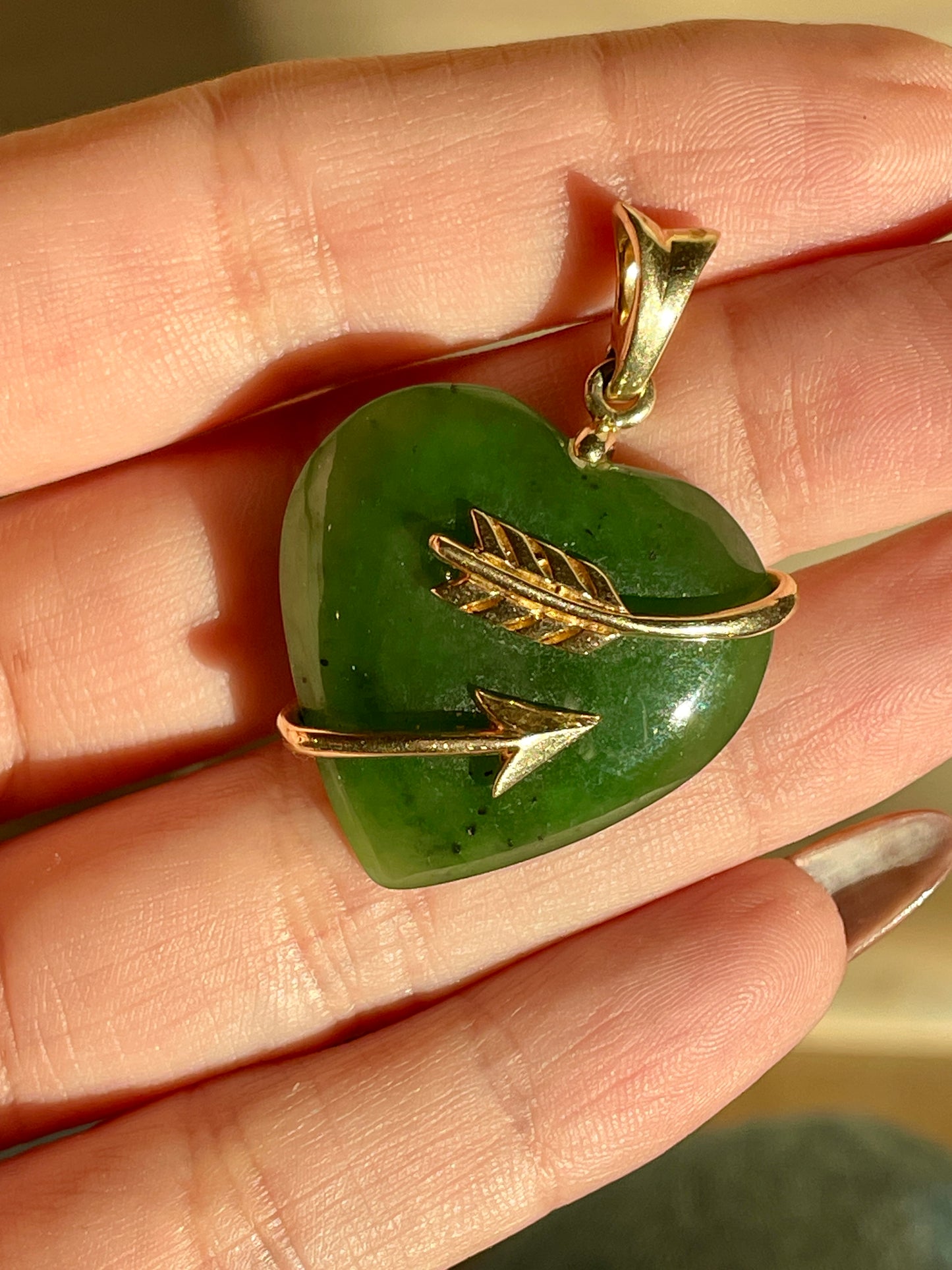 Vintage yellow 14K gold jade heart pendant with wrapped arrow