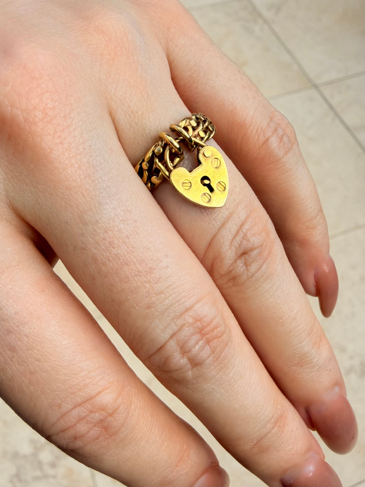 Antique yellow 14K knot ring with operating padlock, size 6.75