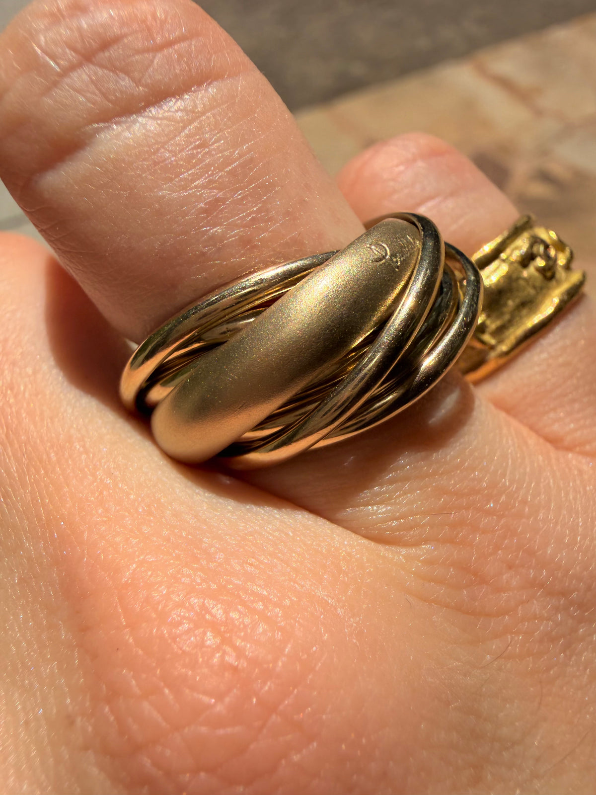 Vintage yellow 18K Pomellato designer eleven band rolling ring, size 6.25-6.5