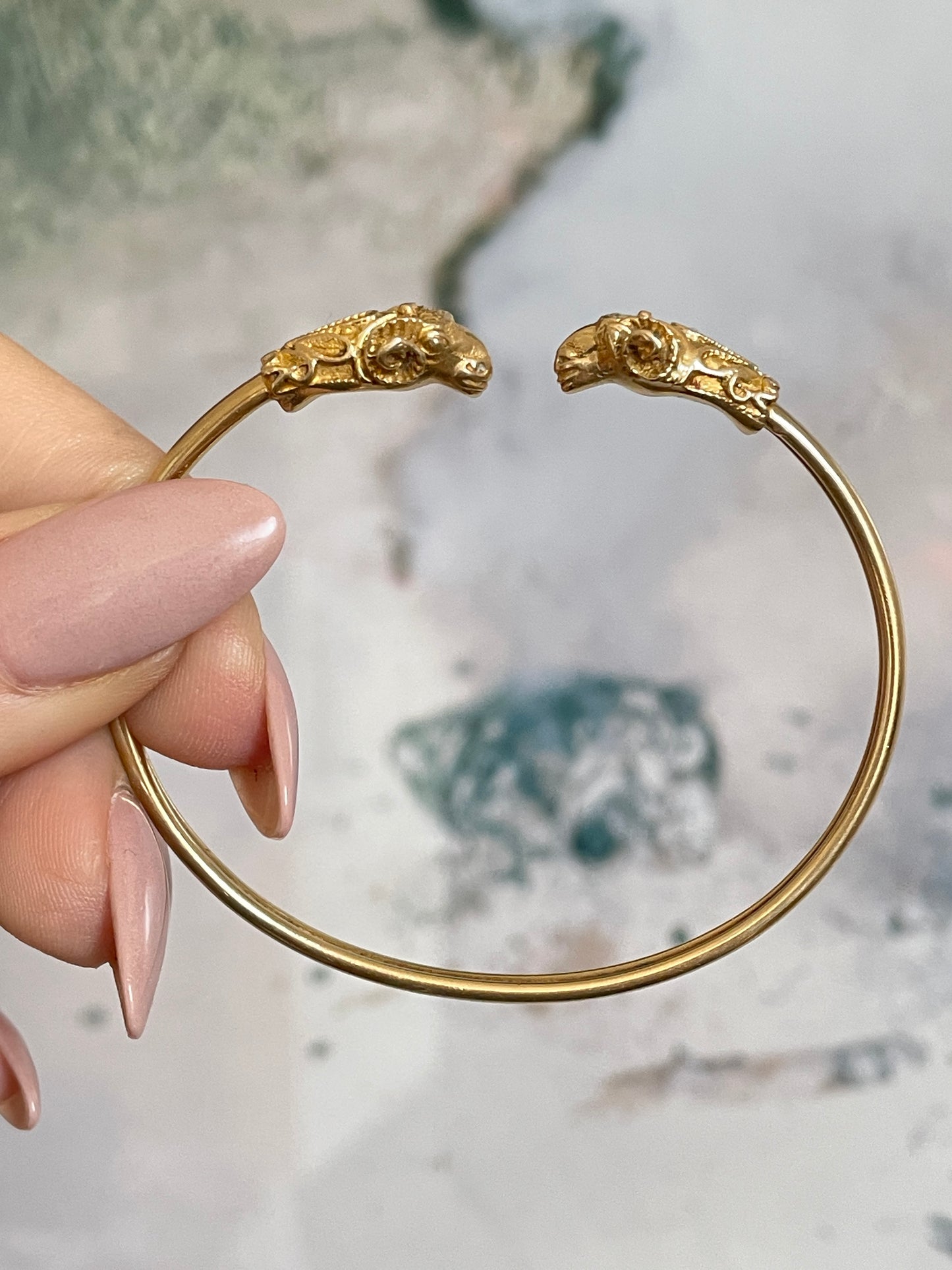 Vintage yellow 14K gold ram heads bangle