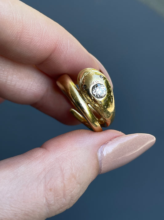 Antique yellow 18K happy face snake ring with approx .27 ctw old European cut diamond and rose cut diamond eyes, size 6.75-7