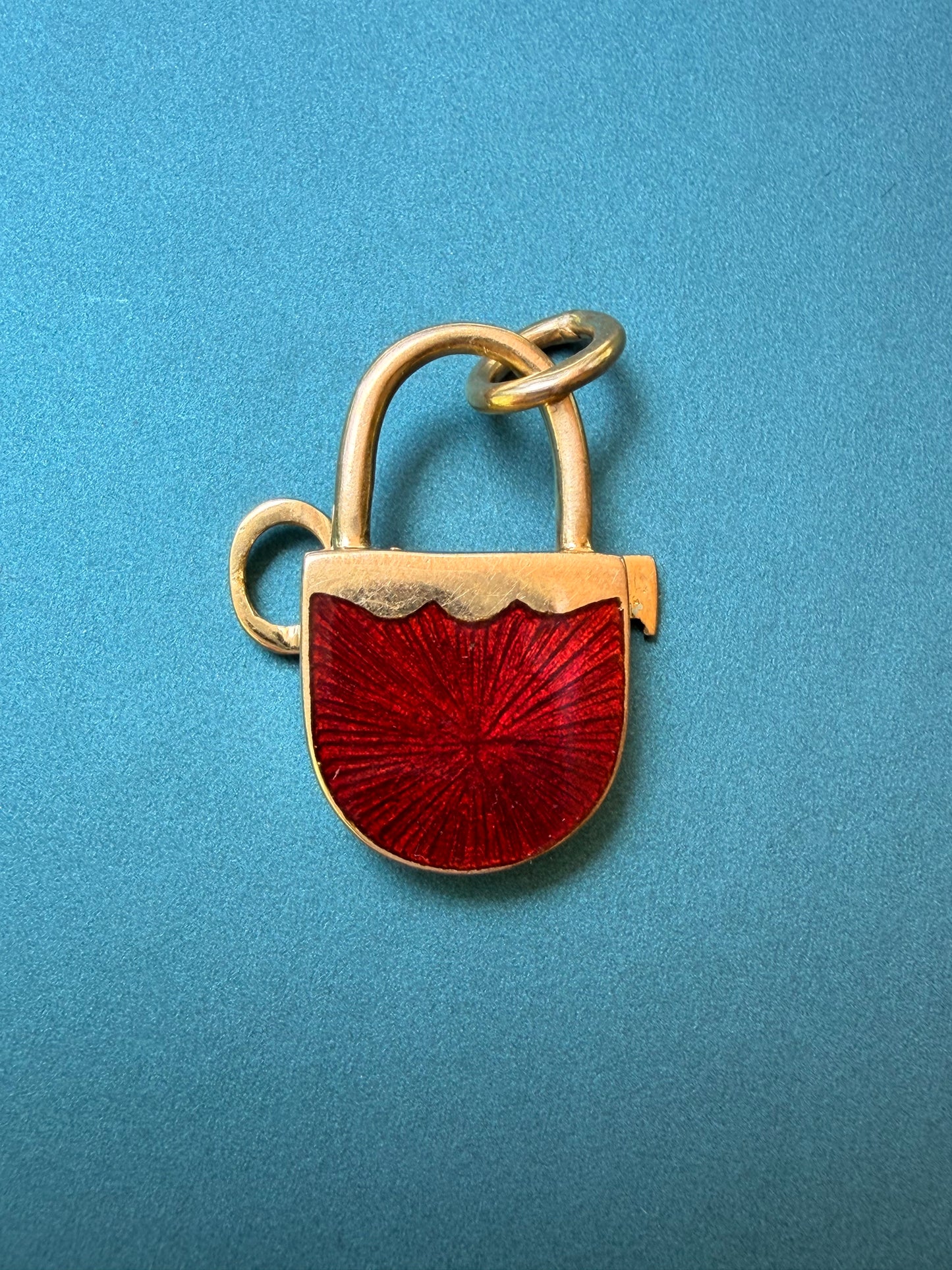 Vintage yellow 18K gold and red enamel lock and key pendant
