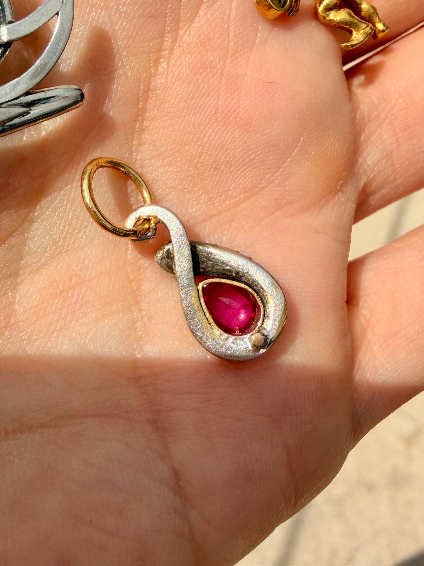Antique 18K snake with rose cut diamonds and .4 ctw ruby charm