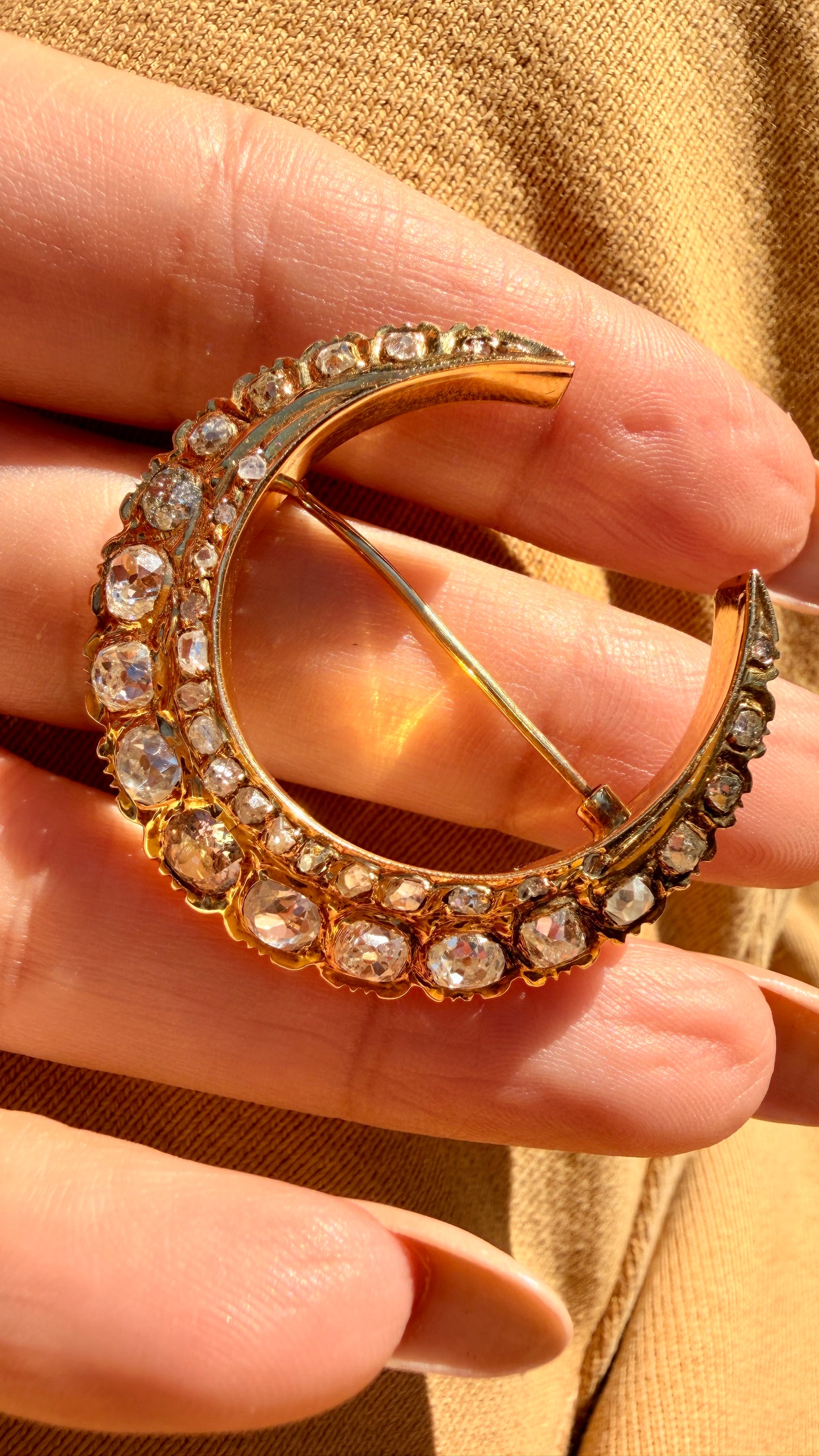 Antique yellow 18K crescent brooch with 2.6ctw of diamonds
